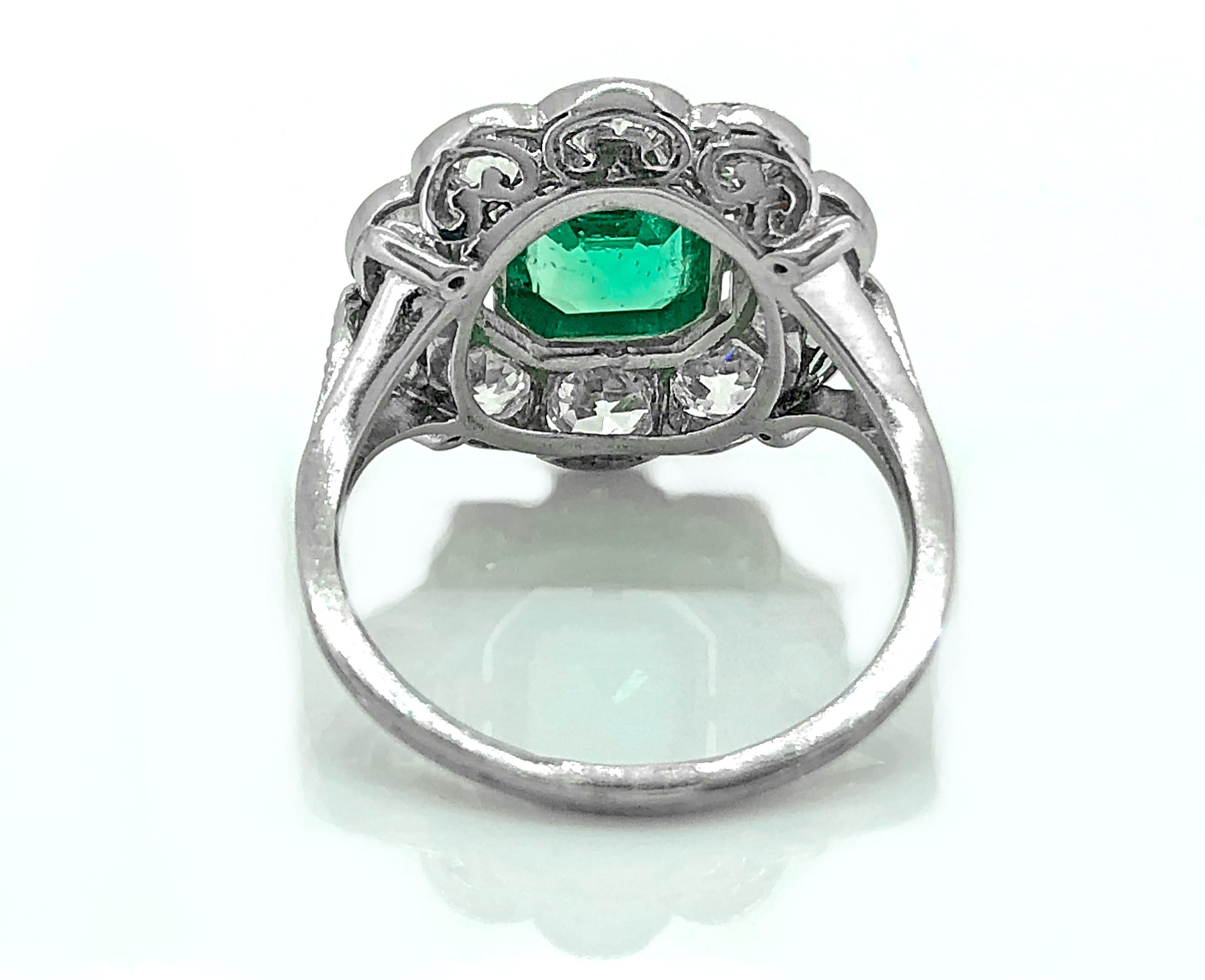 Edwardian .75 Carat Emerald and 1.00 Carat TW Diamond Antique Engagement Ring In Excellent Condition In Tampa, FL