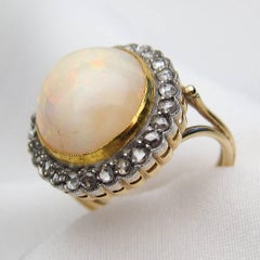 Edwardian 8 Carat White Opal Cabochon and Rose-Cut Diamond 14KT Gold Halo Ring