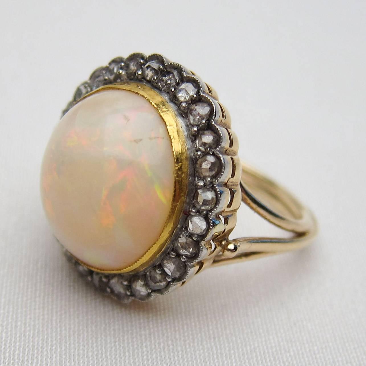 Edwardian 8 Carat White Opal Cabochon and Rose-Cut Diamond 14KT Gold Halo Ring In Excellent Condition For Sale In Seattle, WA