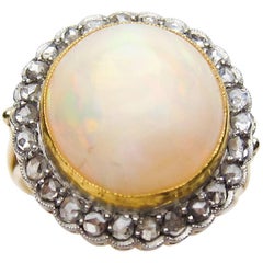 Antique Edwardian 8 Carat White Opal Cabochon and Rose-Cut Diamond 14KT Gold Halo Ring