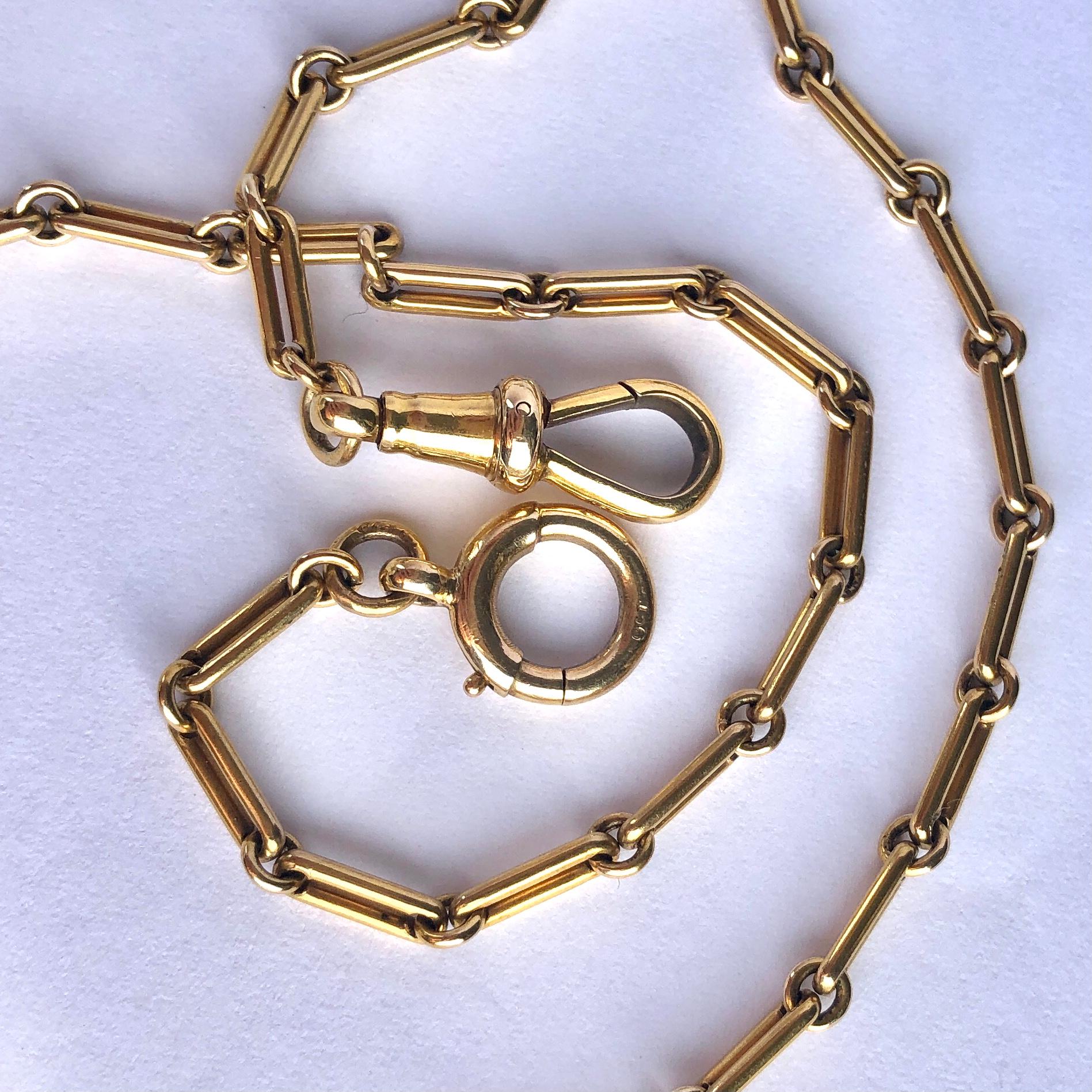 This gorgeous and delicate 9 carat gold chain has a dog clip on one end and a bolt clip on the other. In the middle there is a t-bar on a moveable loop.

Length: 34.5cm

Weight: 10.3g