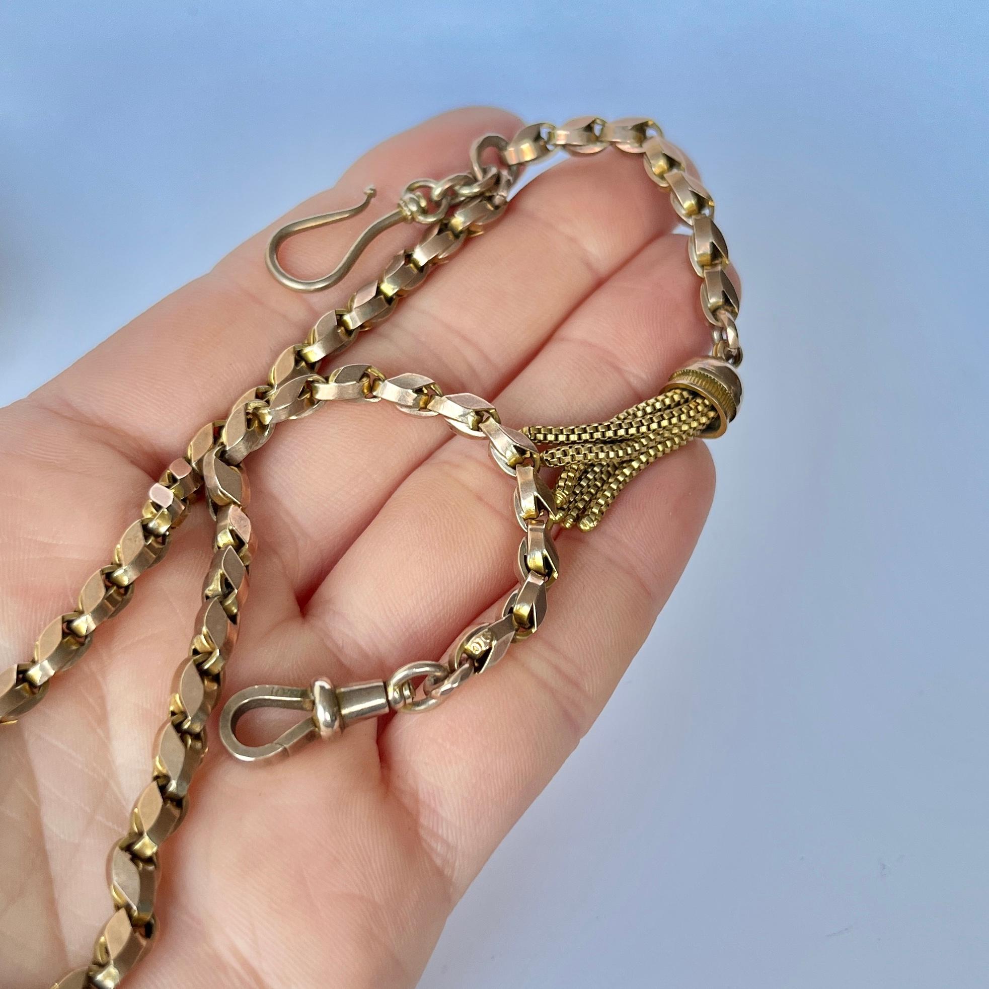 Modelled in 9ct gold, this Albertina boasts so much detail! To start off with it has a dog clip to fasten which then takes you down to a decorative link and ends with a tassel with a hook charm. 

Length from clasp to end: 33cm
Chain Width: 5mm