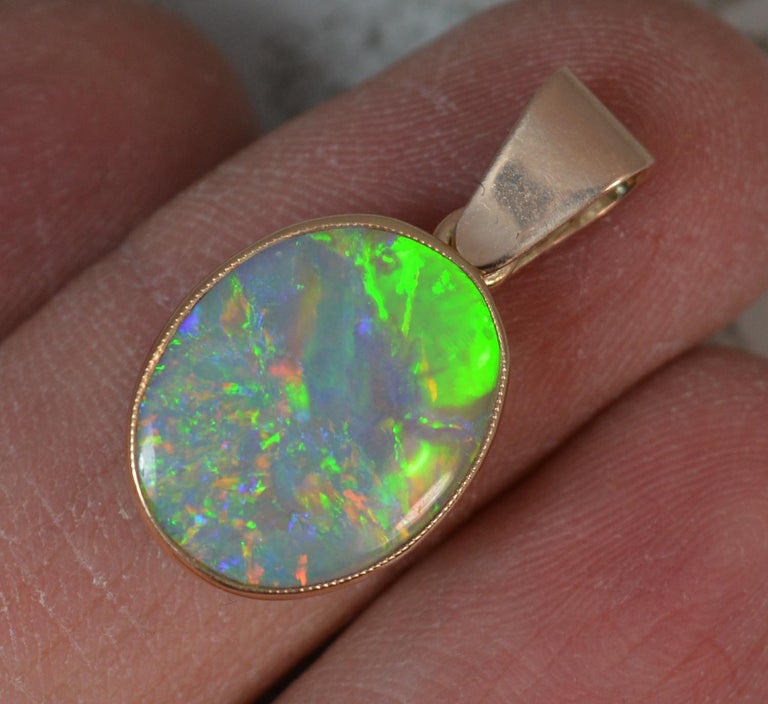 Edwardian 9 Carat Gold and Natural Colourful Opal Pendant at 1stDibs