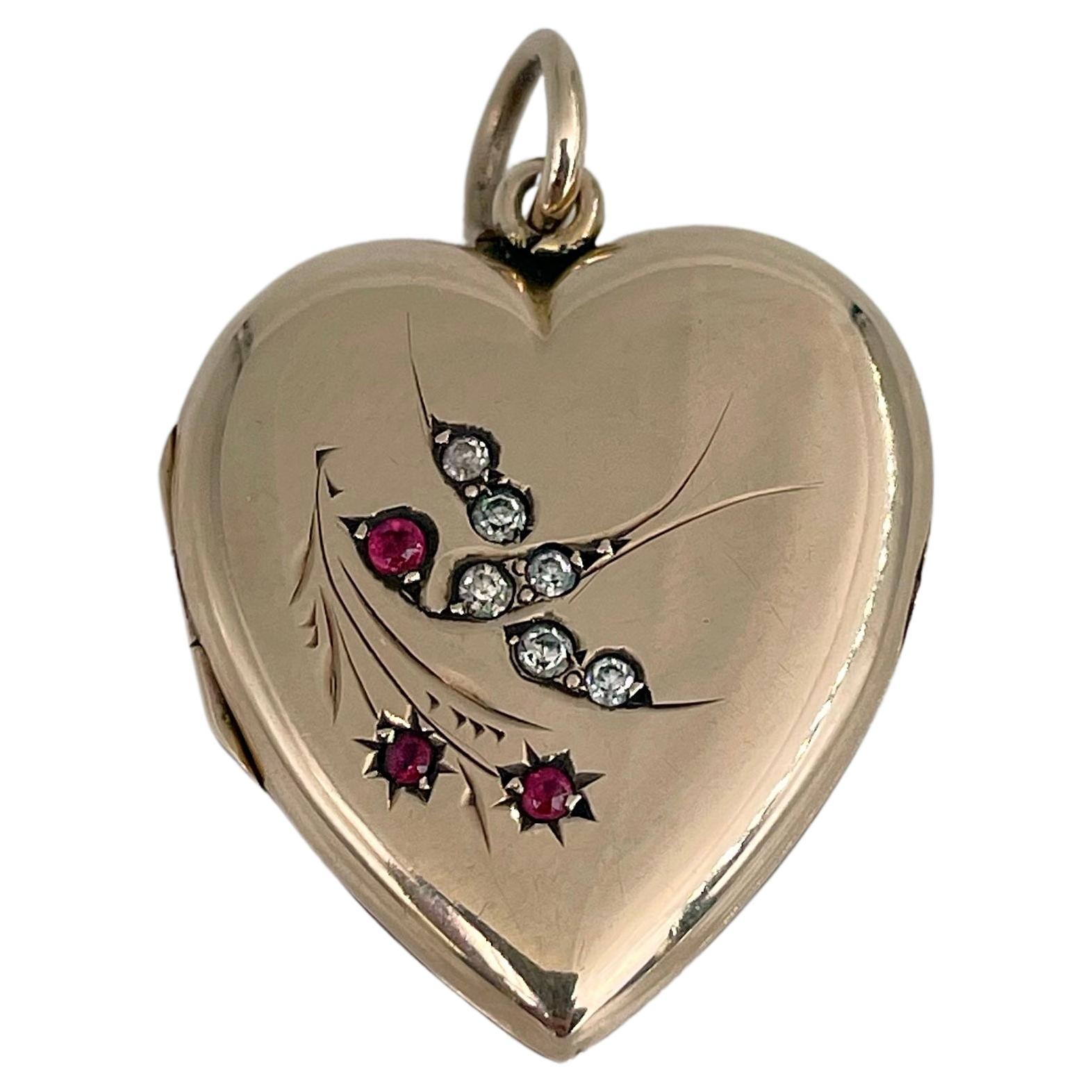 Edwardian 9 Karat Gold Paste Swallow Heart Locket Pendant For Sale