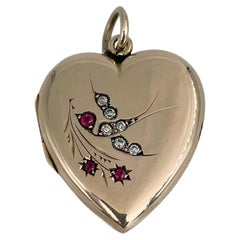 Vintage Edwardian 9 Karat Gold Paste Swallow Heart Locket Pendant