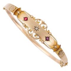 Antique Edwardian 9 Karat Gold Ruby and Diamond Bangle, Circa 1907