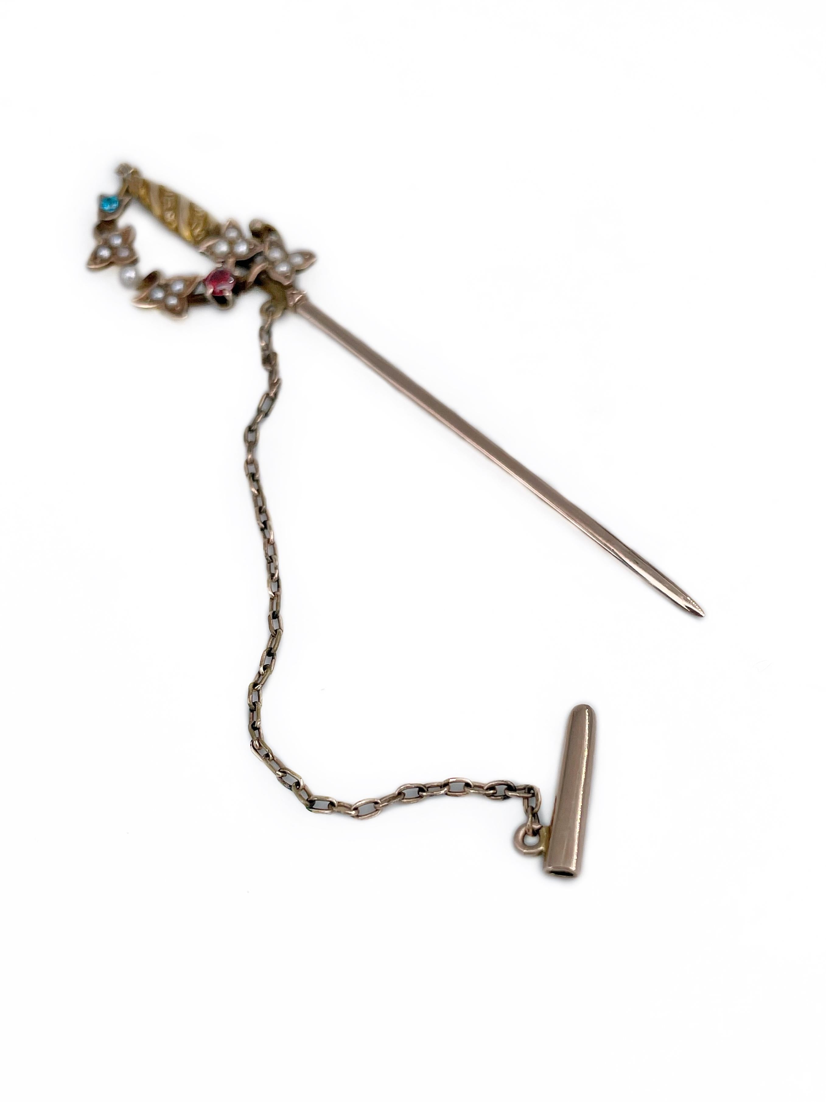 This is an Edwardian bejeweled jabot sword stick pin brooch. It is crafted in 9K yellow gold. Circa 1910. The piece features seed pearls. 

Chain is made of base metal. 

Weight: 3.89g
Length: 8cm

———

If you have any questions, please feel free to
