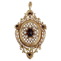 Antique Edwardian 9 Karat Yellow Gold Garnet Pearl Openwork Pendant Brooch