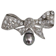 Edwardian 950 Platinum 5.80 Carat Old Cut Diamond Pearl Bow Drop Pin Brooch