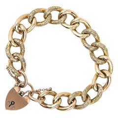 Edwardian 9ct Yellow Gold Curb Link Bracelet and Padlock, circa 1910 Edwardian 9ct Yellow Gold Curb Link Bracelet and Padlock, circa 1910