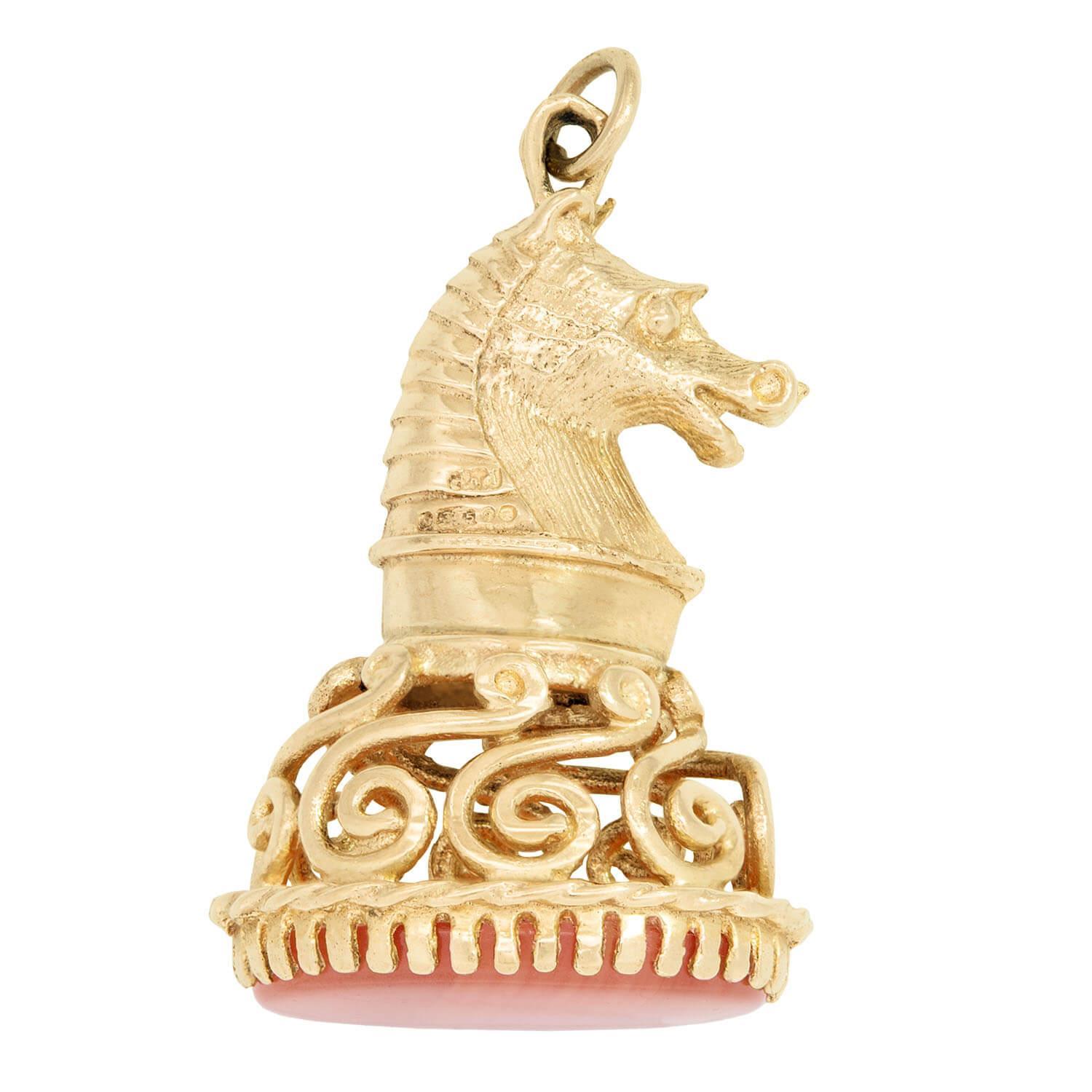 A fob is an adornment or a seal that hangs from the ribbon or chain of a pocket watch. Its purpose is to decorate or add weight to the watch chain itself making it easier for the watch to be withdrawn from a pocket. A spinner or swivel fob has two
