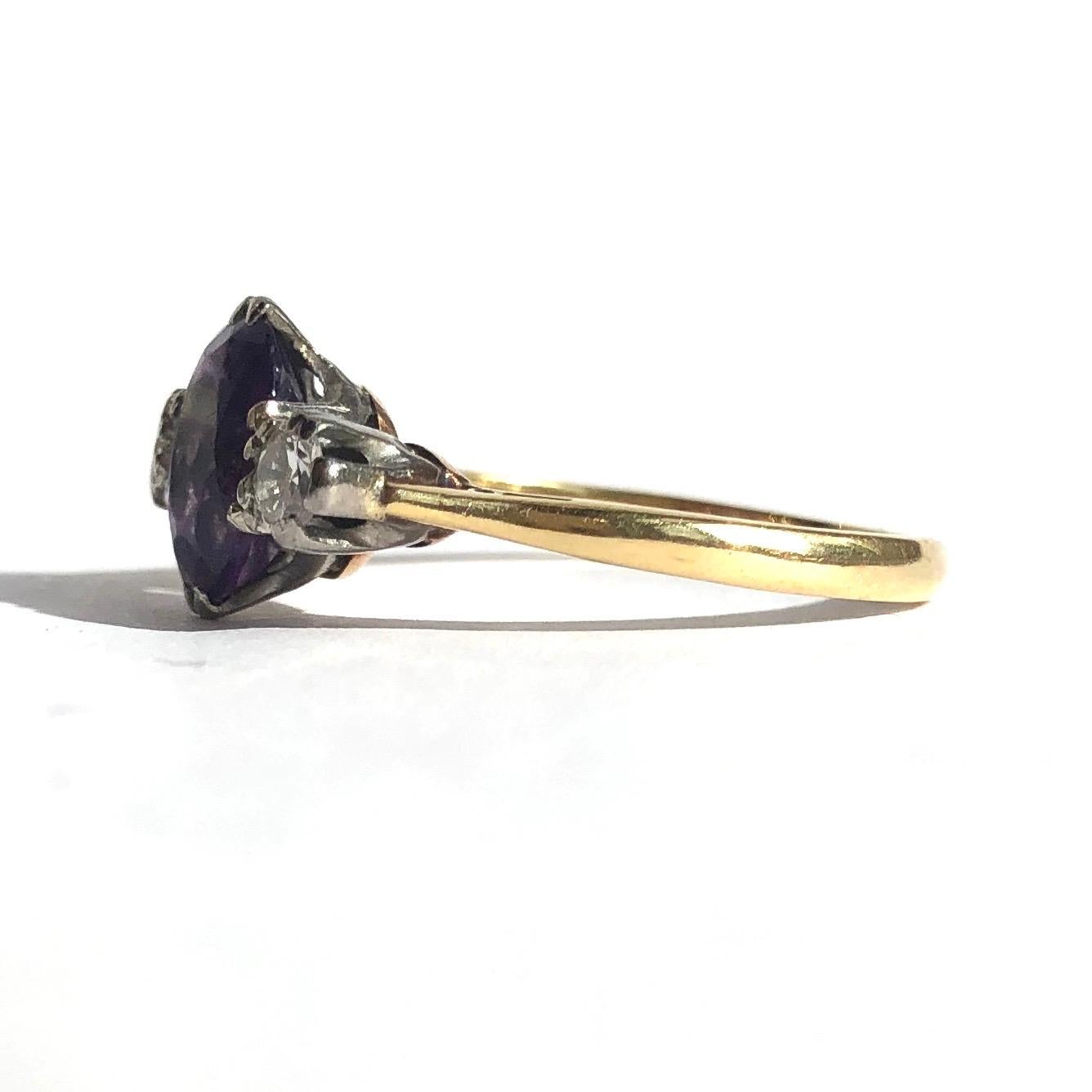 The bright purple of this amethyst is complimented beautifully by the bright sparkling diamonds that sit either side. The amethyst measures approximately 2ct and the diamonds measure 15pts each. The stones are set in platinum and the rest of the