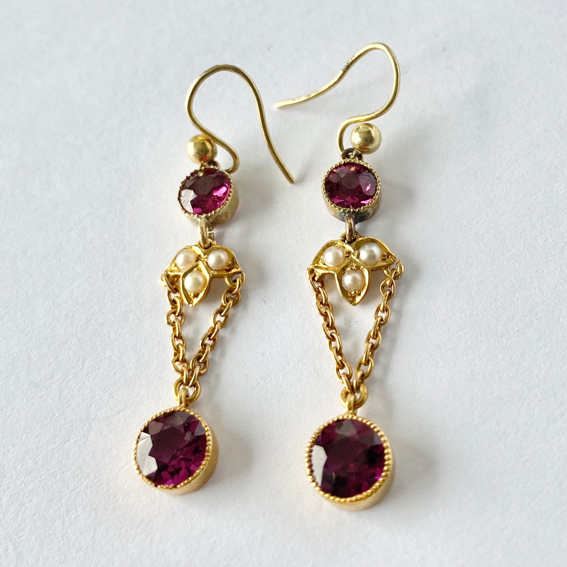 The way these drop earrings glisten in the light is stunning. The bright purple/pink amethyst is such a gorgeous colour and is complemented by the glossy gold. The delicate chain work holds the amethyst stones and have a delicate leaf shape set with