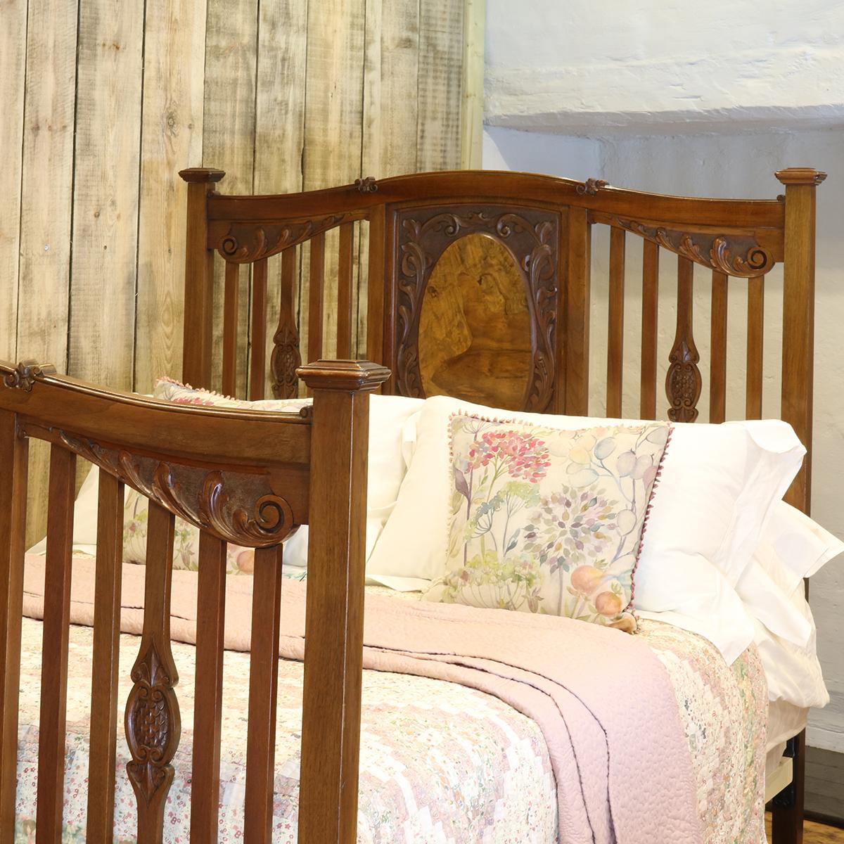A handsome mahogany Edwardian antique bed with slatted and burr wood panels. 

This bed accepts a double size (54 inches wide) base and mattress set.

The price includes a standard firm bed base to support the mattress. 

The mattress, bedding and