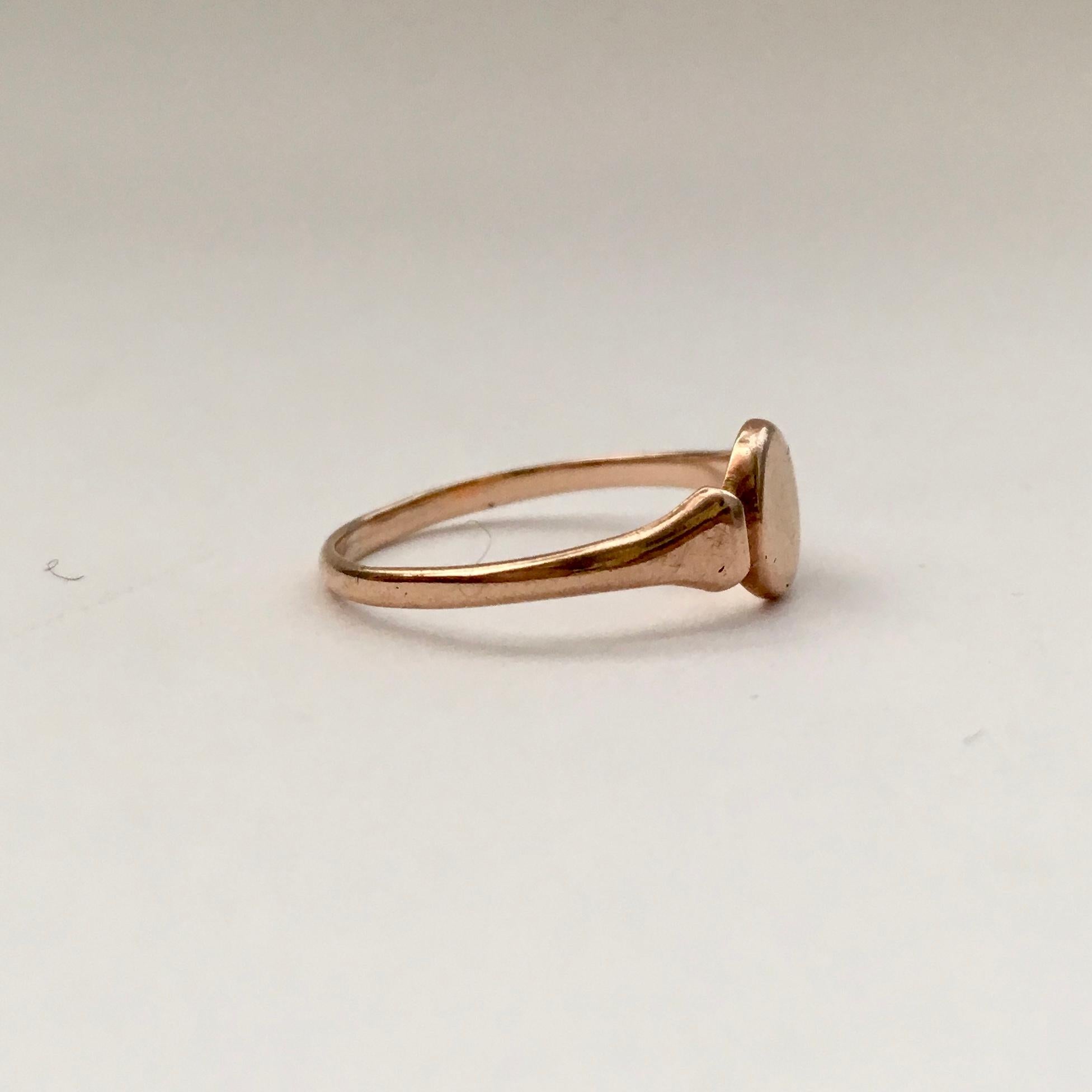 The signet ring is a an understated classic. This is a pretty rose gold example that dates from the Edwardian era. A petite size, it makes the perfect pinky or midi ring. The signet section of the ring measures 0.6cm high and 0.5cm wide. It is