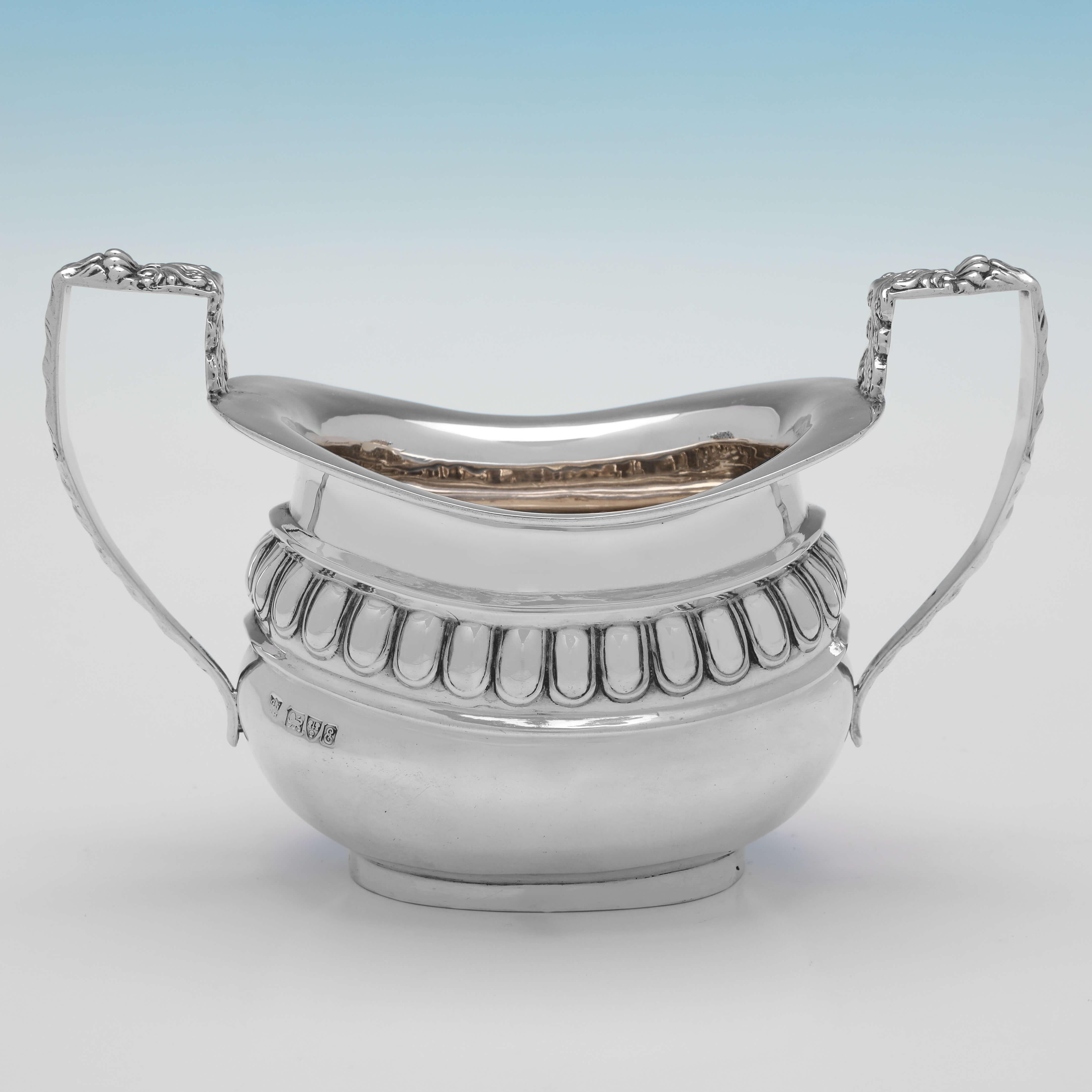 Hallmarked in Chester in 1905 by Nathan & Hayes, this charming, Antique Sterling Silver Sugar And Cream Set is comprised of a sugar bowl that measures 4