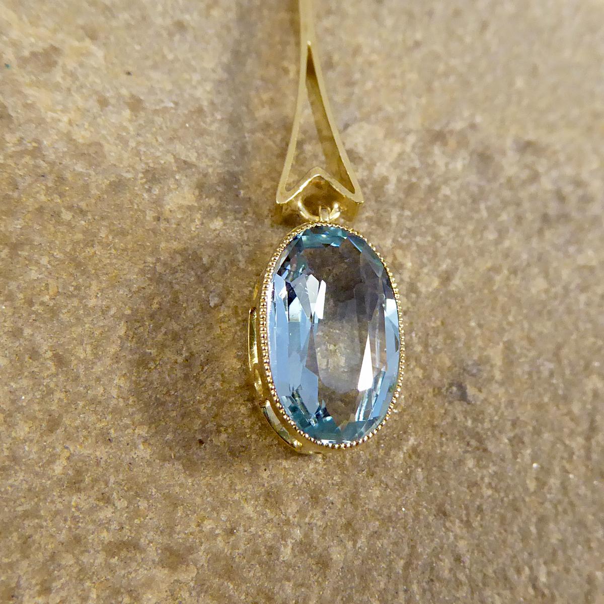 This gorgeous little necklace has been hand crafted in the Edwardian era with love and quality. Sitting on an attached 15ct Yellow Gold chain is a collar set Round Aquamarine with an Oval Aquamarine drop in a 15ct Yellow Gold setting. The perfect