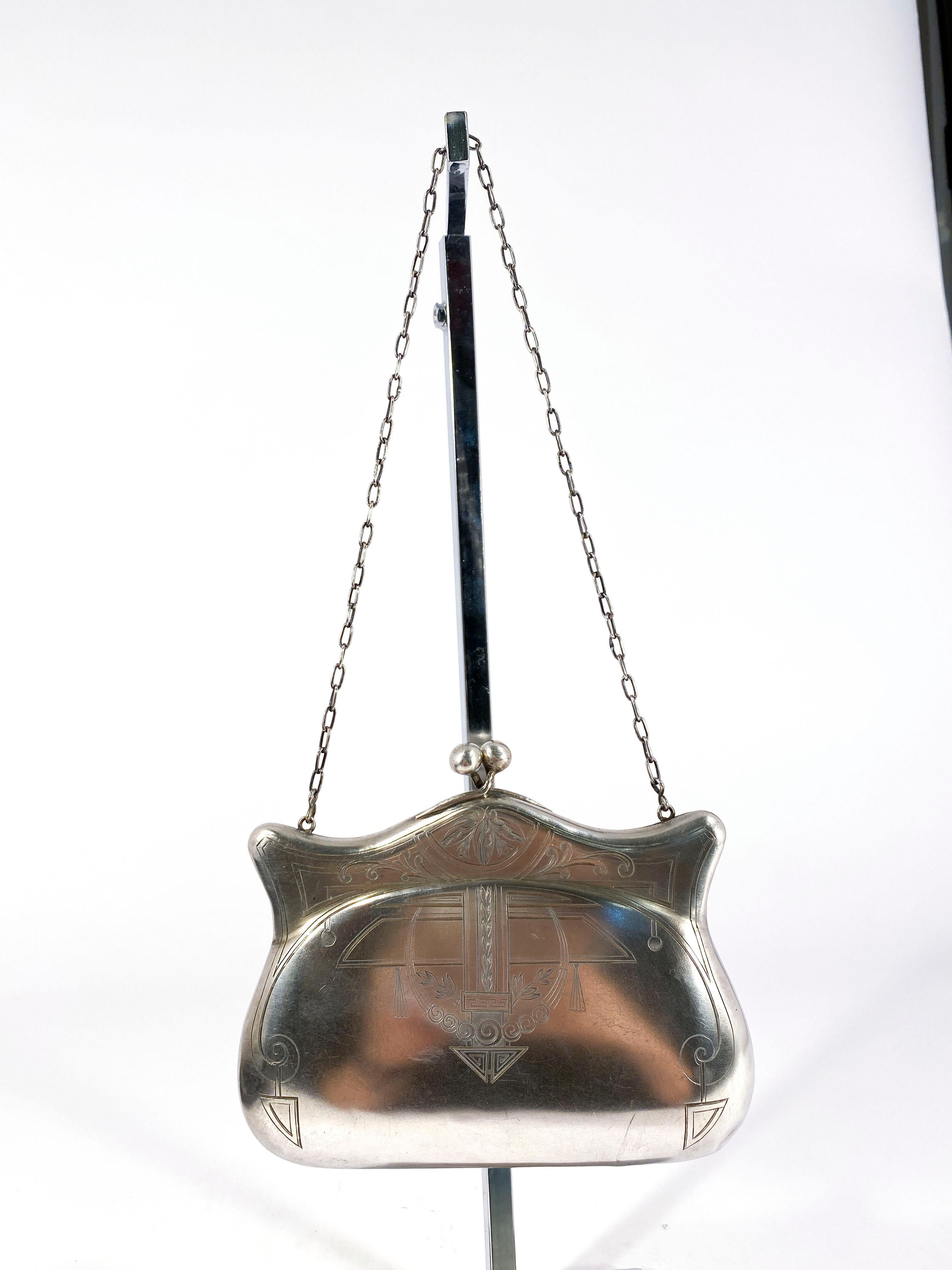 Edwardian Russian silver Art Nouveau hand etched evening purse. The intricate etching is all hand-done along the top and down the sides of the front part of the purse. The lining is missing but not necessary while worn. The handle is an extra long