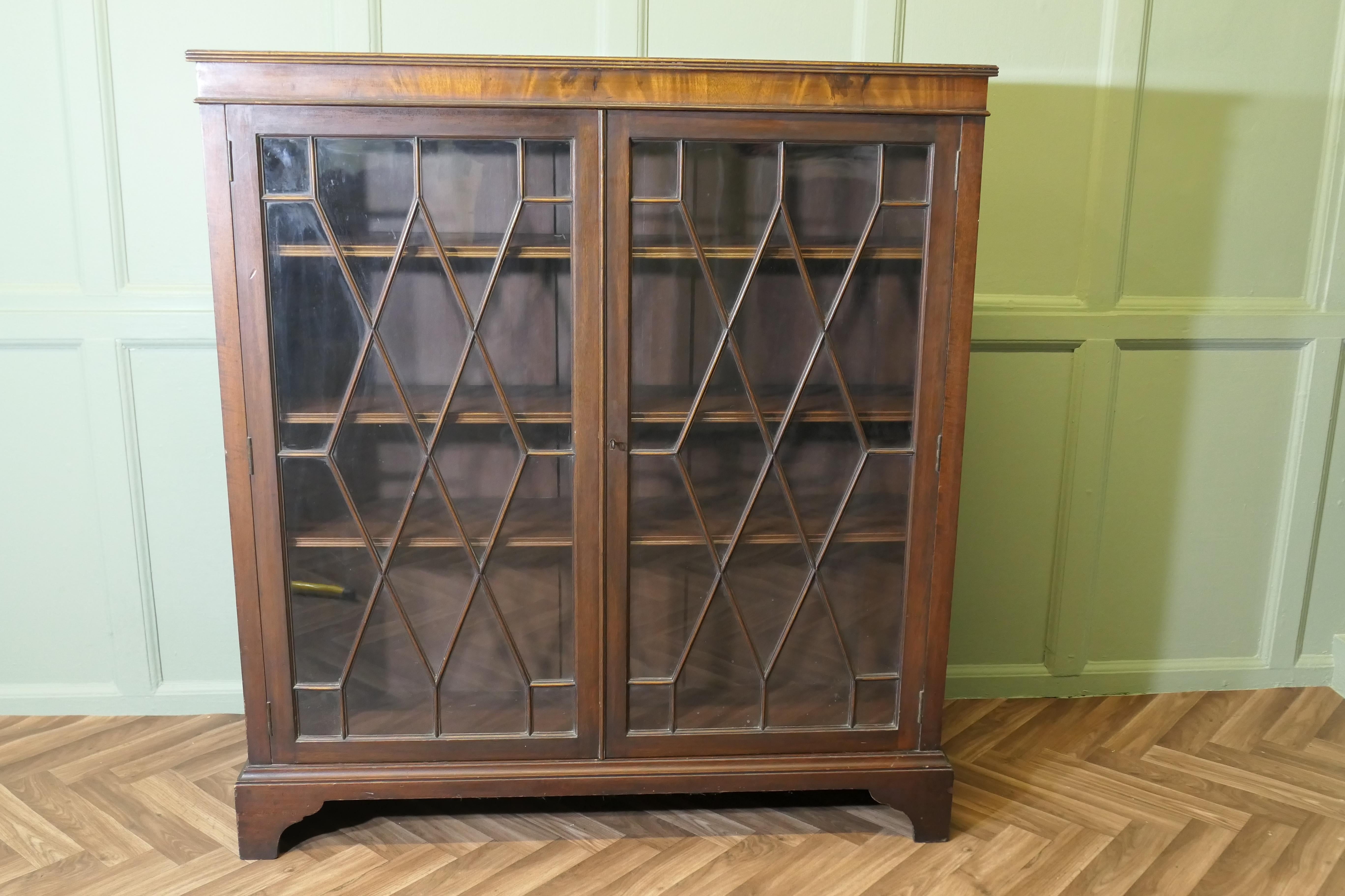 Edwardian Astral Glazed Display Cabinet/Book Case

This is a very attractive piece, it has 2 astral glazed doors with 3 adjustable shelves inside, it stands on small bracket feet
The Cabinet is in good attractive condition, it is 45” tall, 41” wide