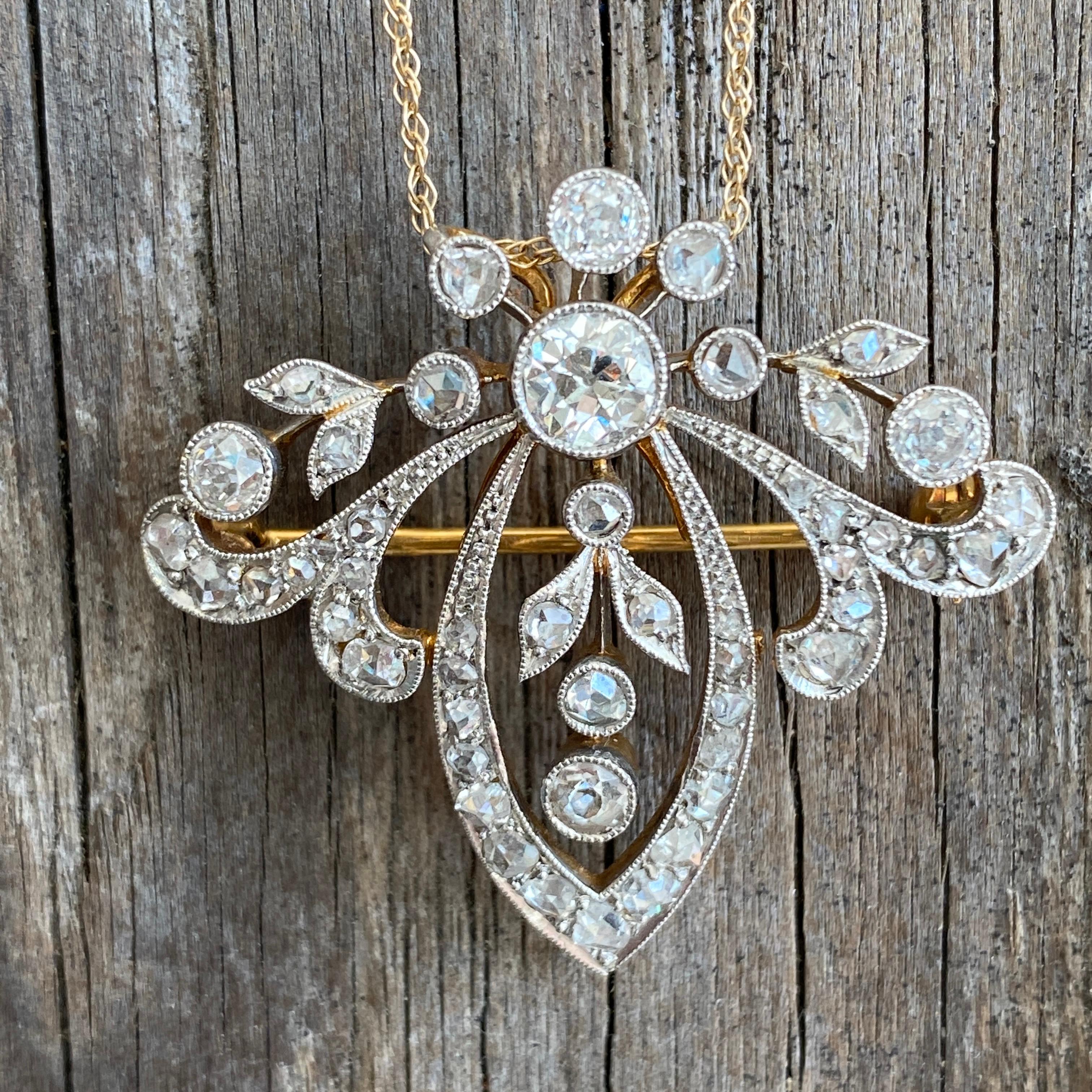 Details:
Edwardian Belle Époque diamond pendant/brooch from the early 1900's. There is a count of 50 diamonds, the largest being 5mm and 1/2 carat. There are 5 large bezel set Old European Cut diamonds and the balance are bead set and bezel set rose