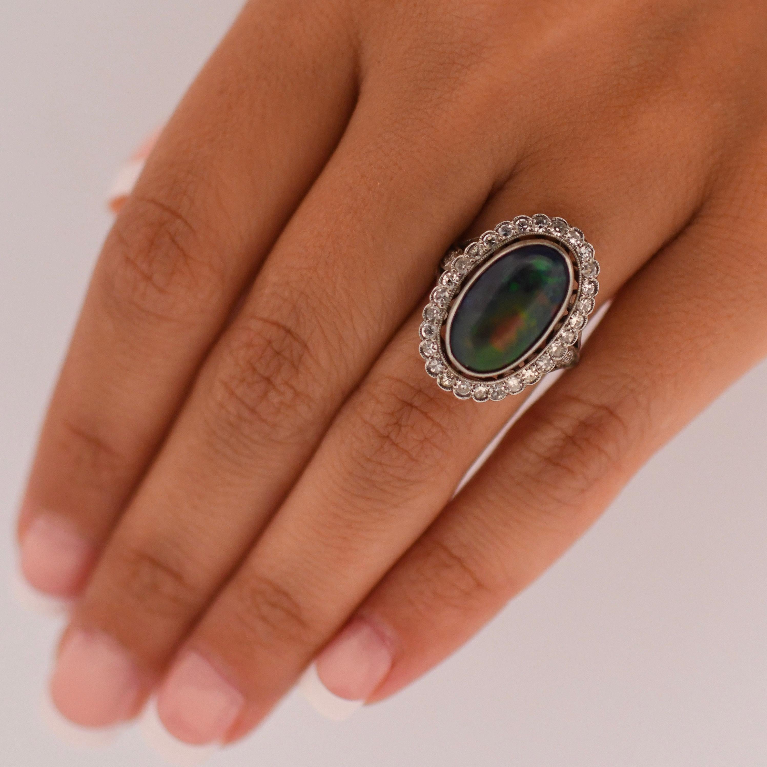 Edwardian Black Opal Cabochon and Diamond Halo Vintage Platinum Ring In Good Condition For Sale In Addison, TX