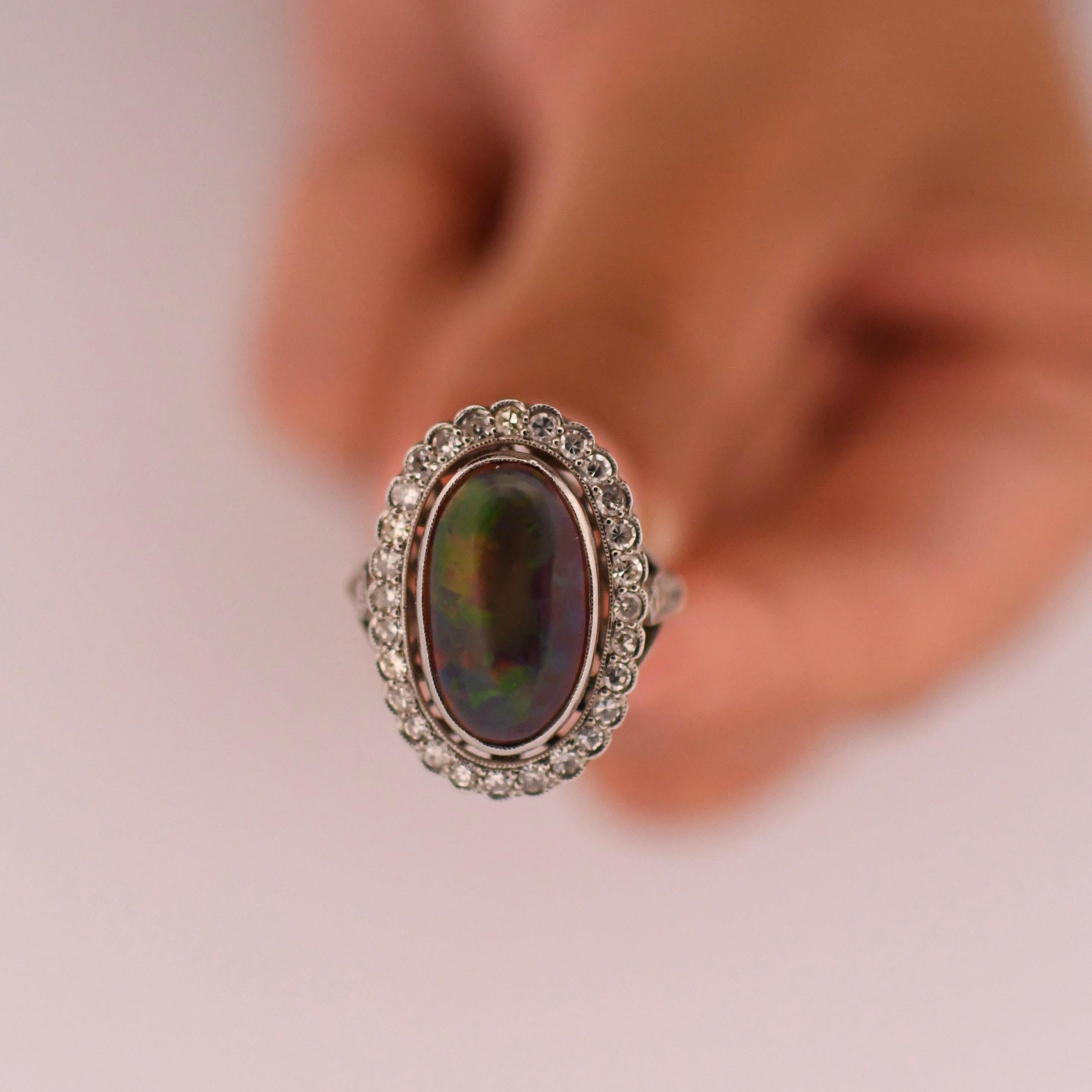 Edwardian Black Opal Cabochon and Diamond Halo Vintage Platinum Ring For Sale 2