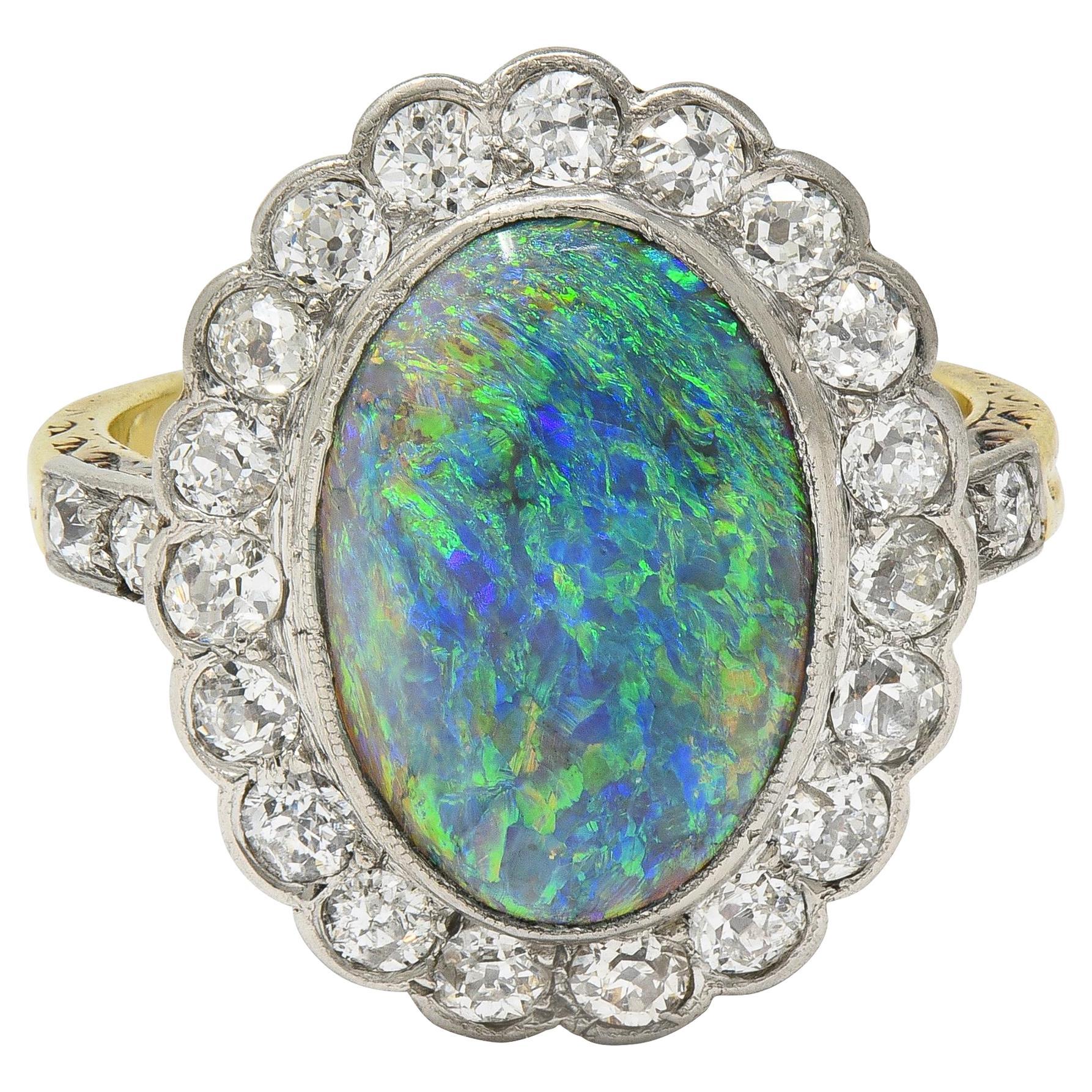 Edwardian Schwarzer Opal Diamant Platin 18 Karat Gelbgold Antiker Halo Ring