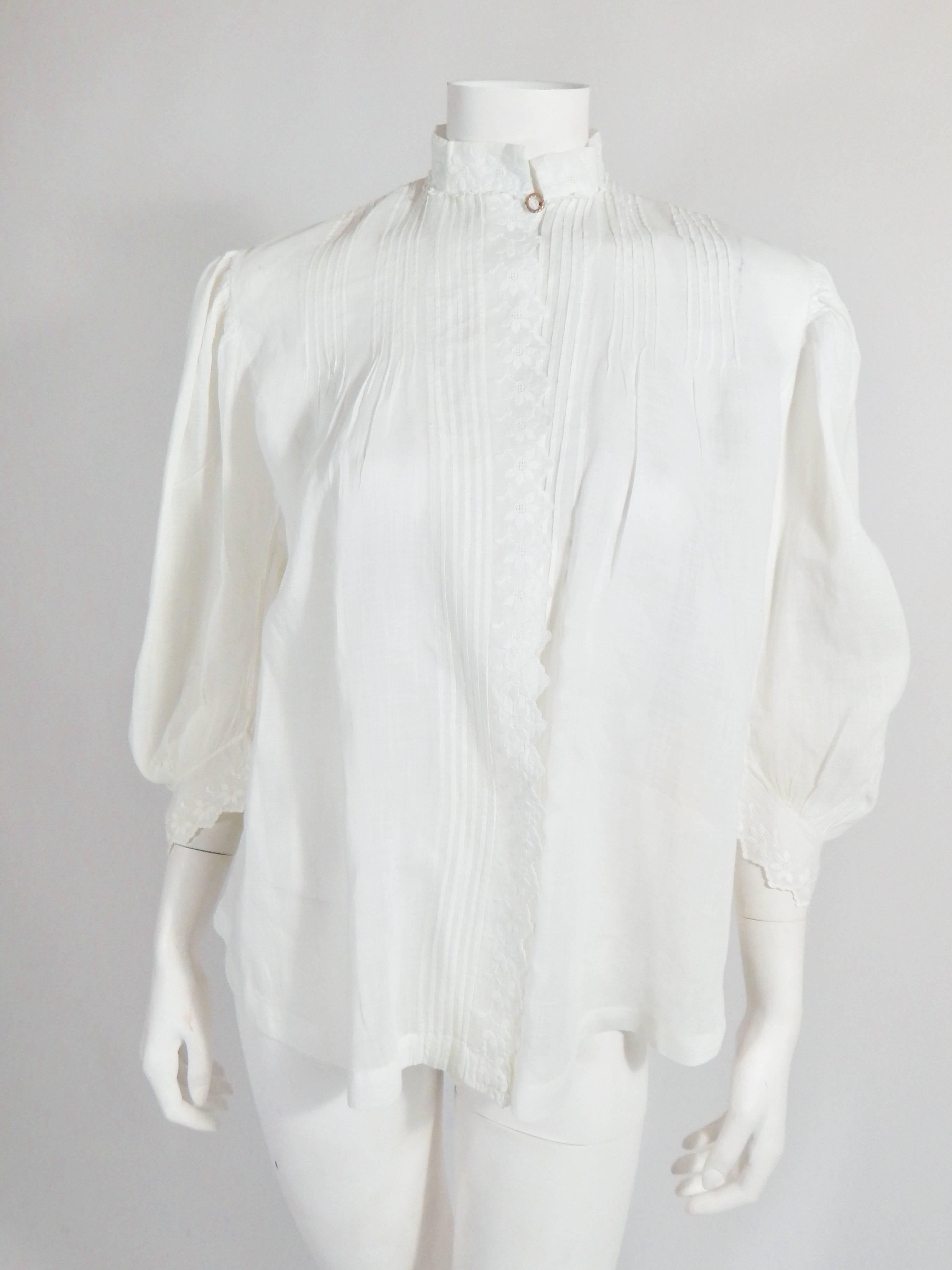 Lovely Edwardian Vintage Antique Blouse Made with Fine White Cotton and White Embroidery. Pleated Shoulders. Embroidered detail on Collar, sleeves and down front. The special detail is that it still has the original Edwardian pin for the Collar.