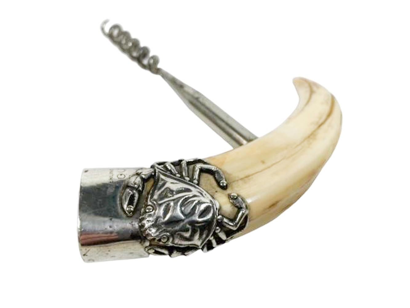Edwardian Boar's tusk handled corkscrew with a sterling silver crab mounted on the monogrammed sterling end cap. Marked 'Sterling
