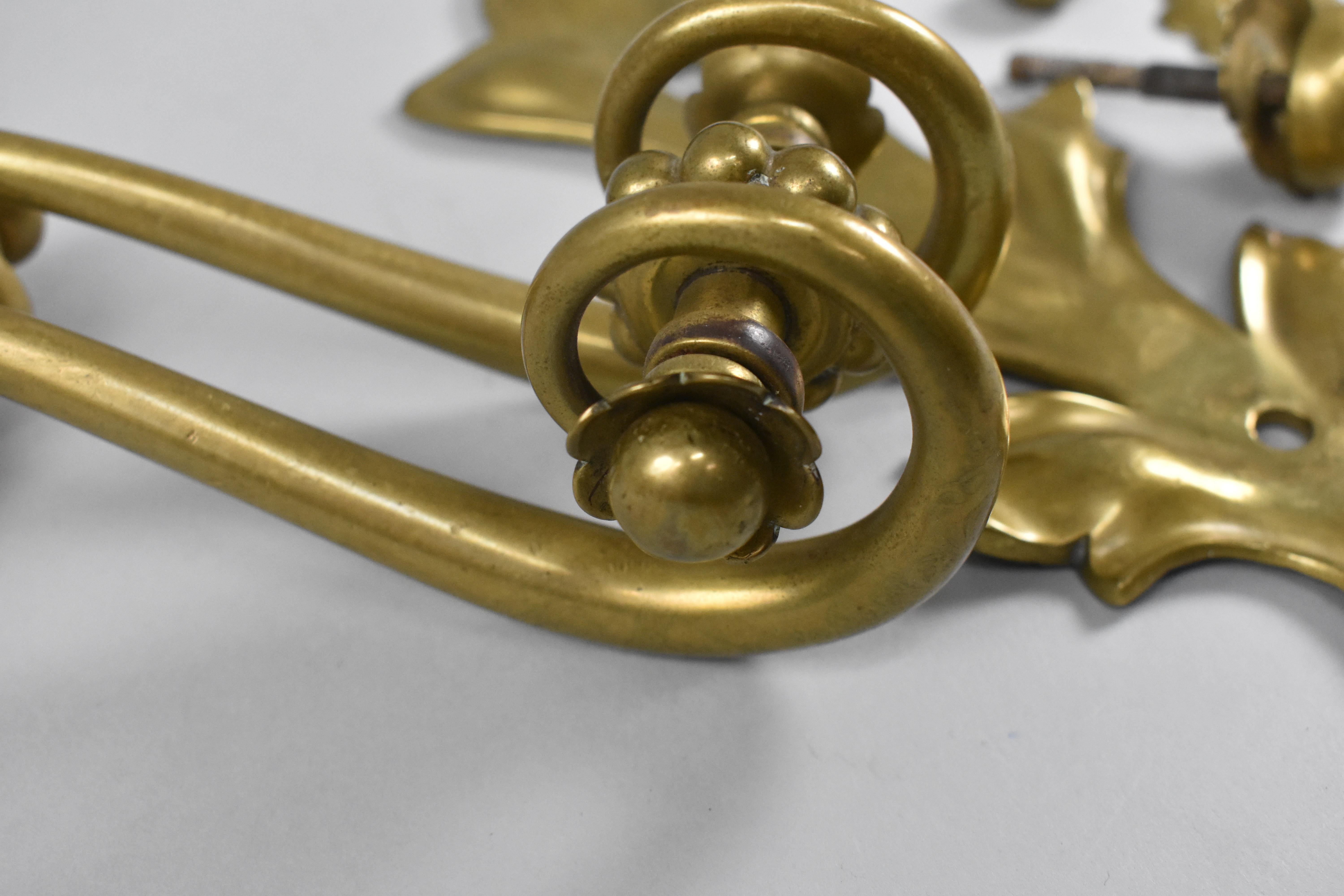 A good vintage brass door knocker. Graceful 
