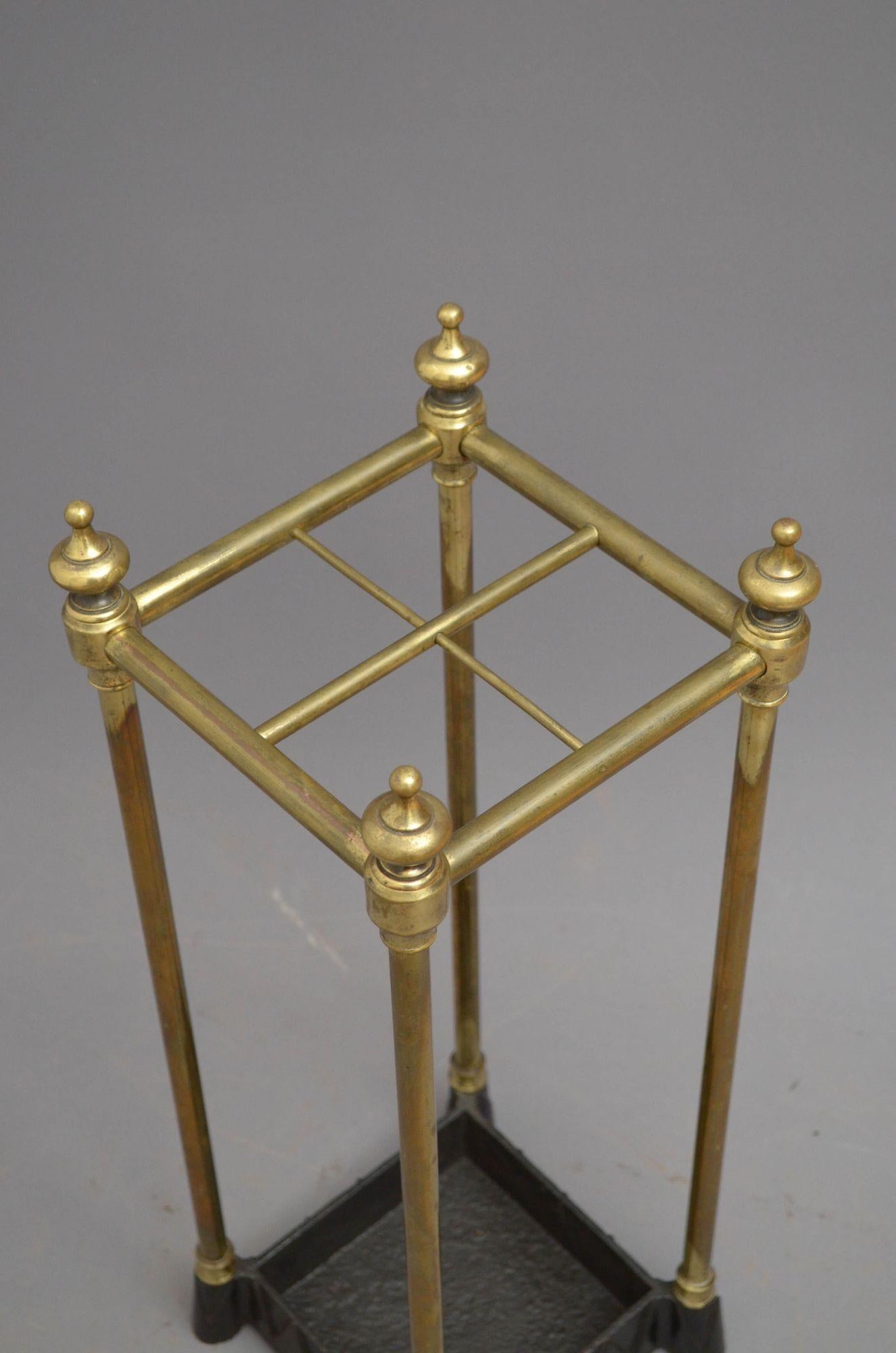 R011 Edwardian brass umbrella stand with four divisions, finials and drip tray with dog tooth decoration. This antique umbrella stand retains its original patina, all in home ready condition. Can be polished on request. c1900
H24.5