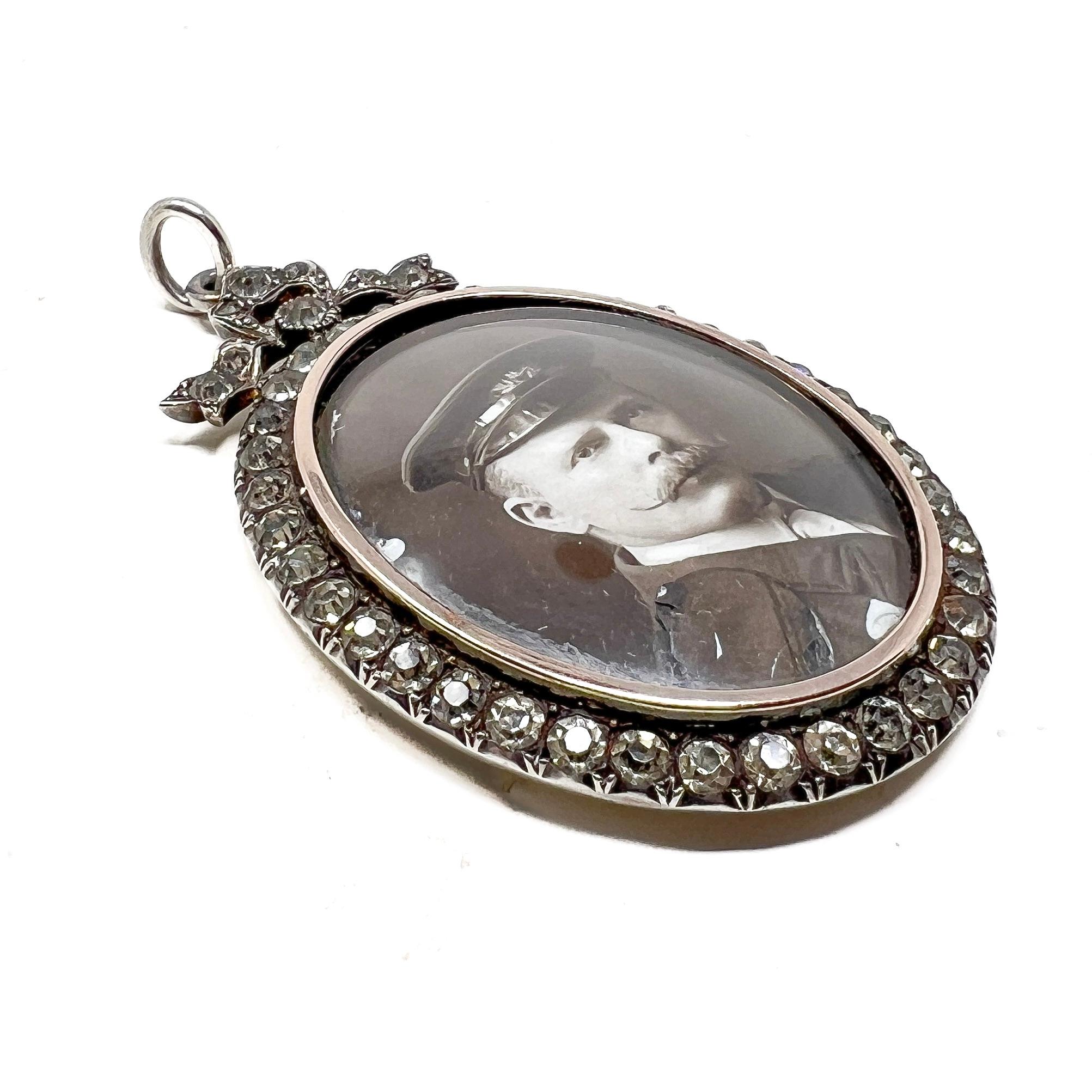 Women's RESERVED - Edwardian c.1900 Silver and Paste Bow Design Antique Locket