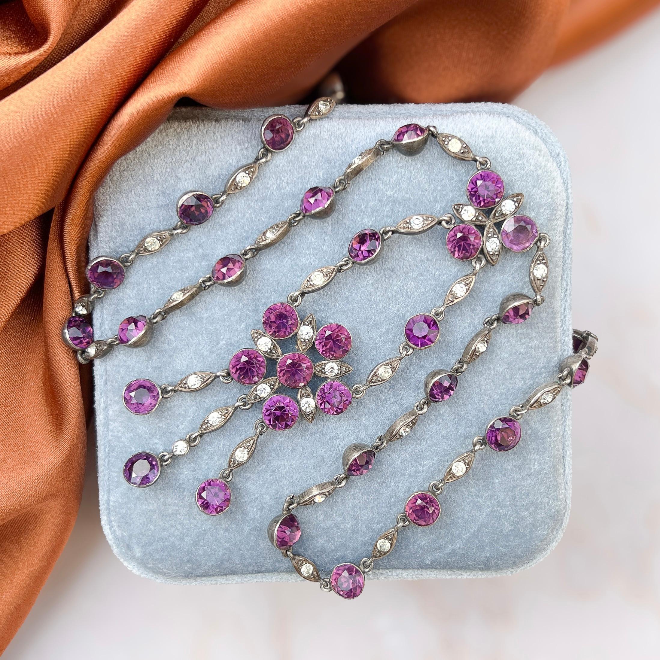 This elegant necklace dates from c.1900 and represents beautifully the floral jewels so typical of Edwardian era. 

Condition Report:
Excellent

The Details...
Although un-hallmarked, this necklace tests as being constructed from silver. It features
