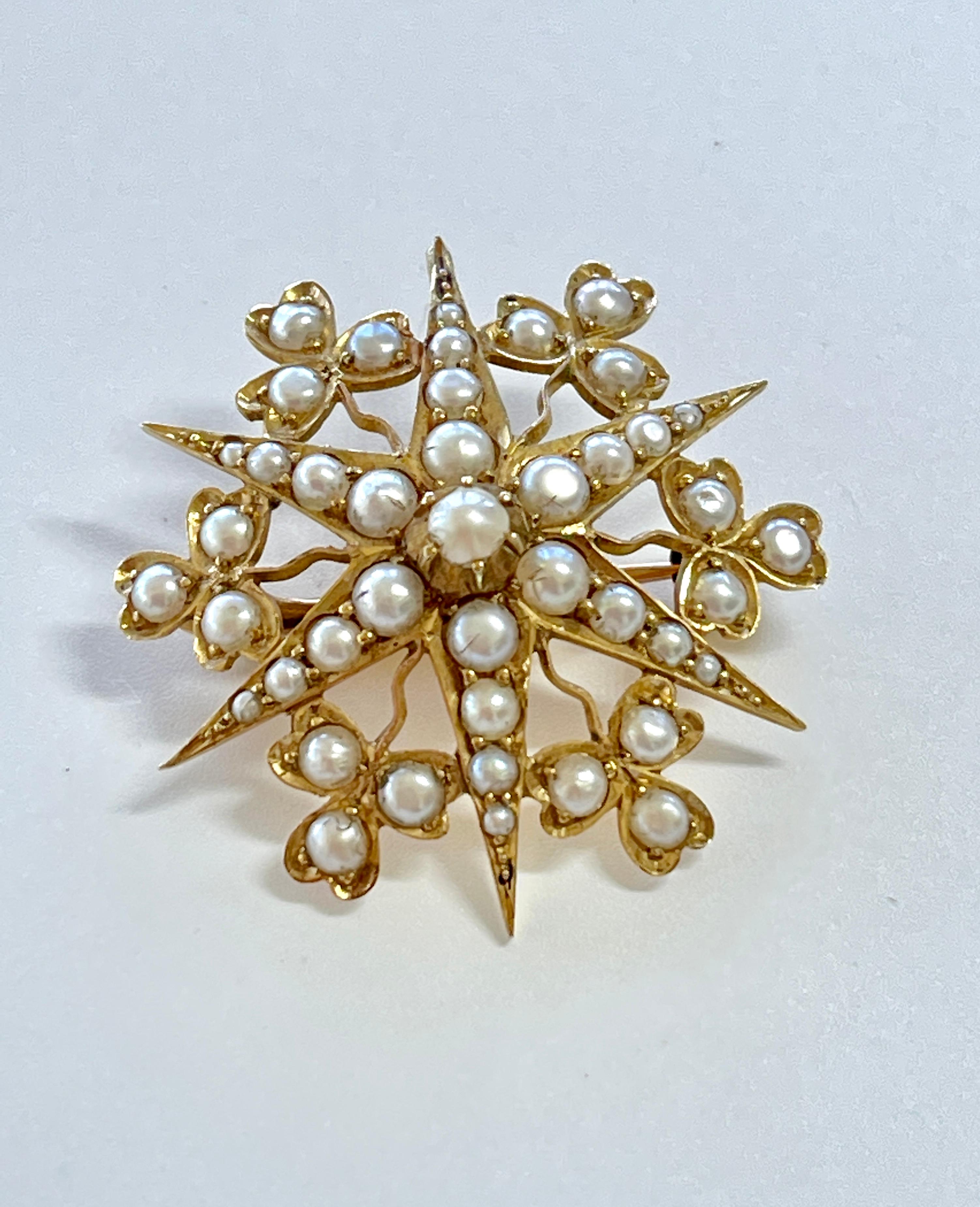 This gorgeous brooch will grab your heart!
It is a wonderful Edwardian piece c1905, that features very lustrous, split pearls, set in a star and hearts design.  The lustre on these pearls is really good and it makes the brooch quite eye catching. 