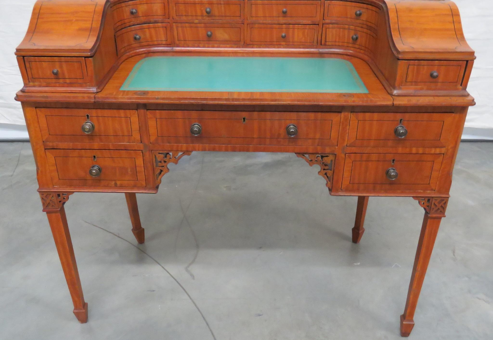 Edwardian Carlton House satinwood leather top writing desk with double raised tier of drawers, retractable writing board and 5 lower drawers.