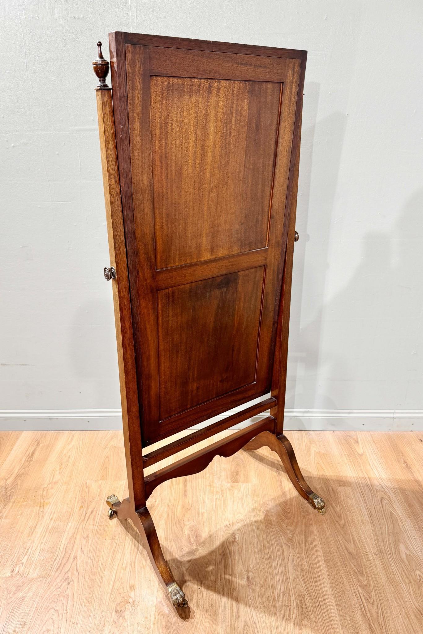 You are viewing a gorgeous period Edwardian cheval mirror
Glass is clear and blemish free and this would be great as a full length dressing mirror in any room
Crafted from mahogany and swivel mechanism works well
On castors so moves around