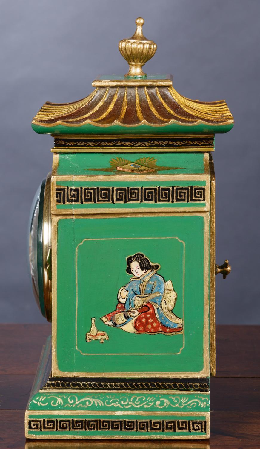 Mappin and Webb

Edwardian mantel clock housed in a chinoiserie decorated case on a green ground with typical Chinese scenes standing on a raised, stepped base and surmounted by a pagoda top with vase finial.

Eight day movement with lever