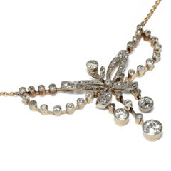 Edwardian circa 1905, 2.49 Carat Diamond Platinum Garland Style Bow Necklace