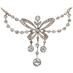 Edwardian circa 1905, 2.49 Carat Diamond Platinum Garland Style Bow Necklace