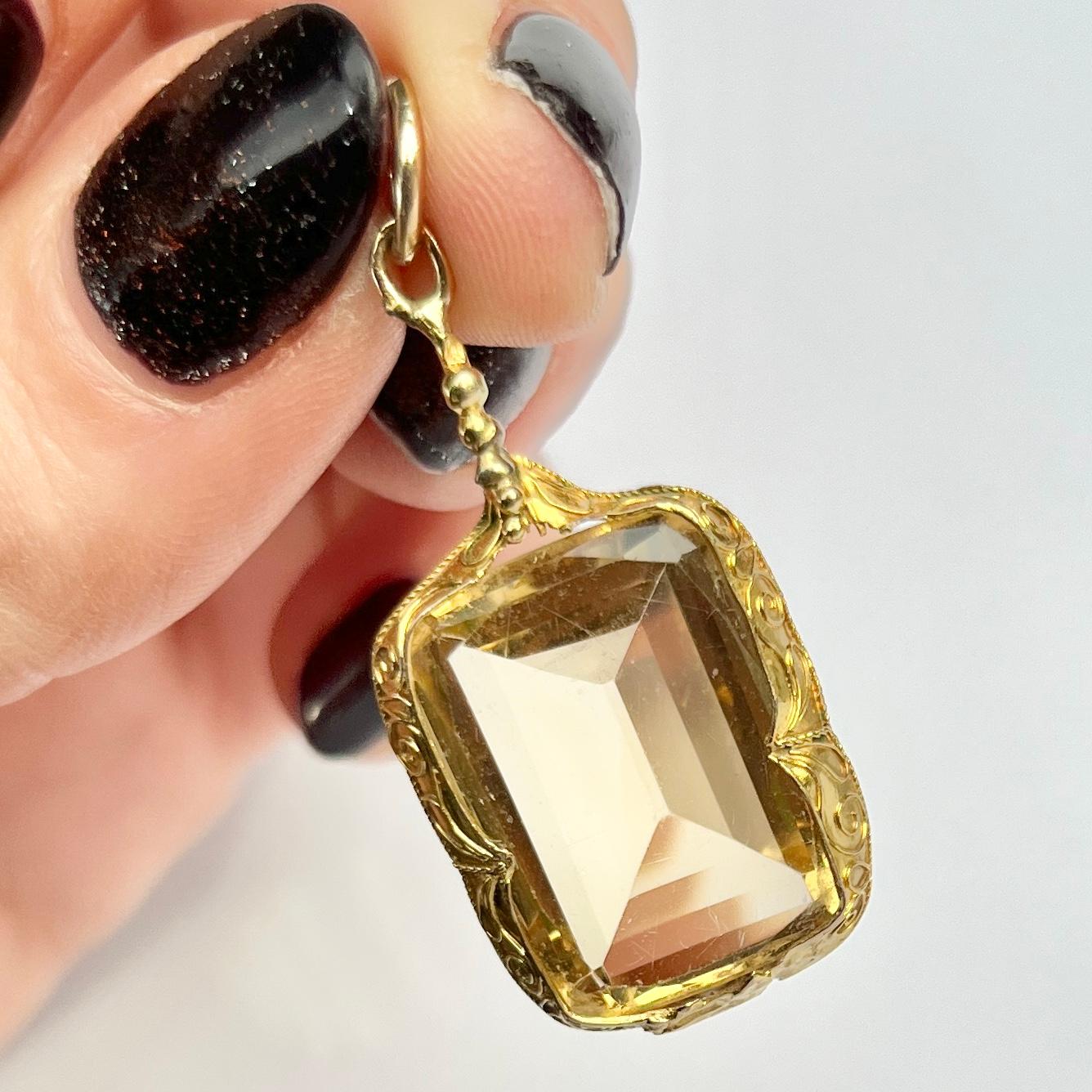 This gorgeous citrine fob can be attached to a necklace or a chain using the loop at the top. This is modelled in 9ct gold and the metal surrounding the stone os decorative.

Stone Dimensions: 21x14mm 

Weight: 5g
