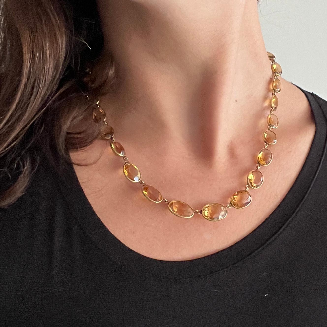 This gorgeous necklace holds 29 stones all set in simple settings. The stones start with larger at the centre and get smaller towards the clasp. modelled in 9carat gold. 

Length:44.5cm
Stone Dimensions: 10x14mm - 7x9mm

Weight: 21.6g 