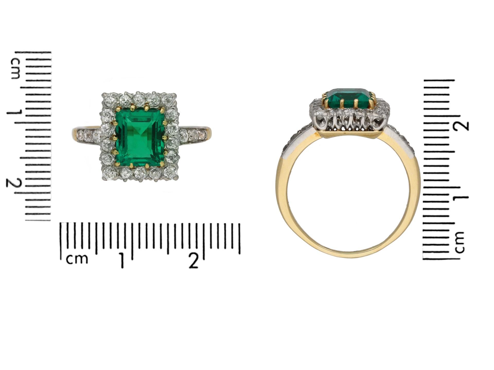 Emerald Cut Edwardian Colombian Emerald and Diamond Cluster Ring, circa 1910 For Sale