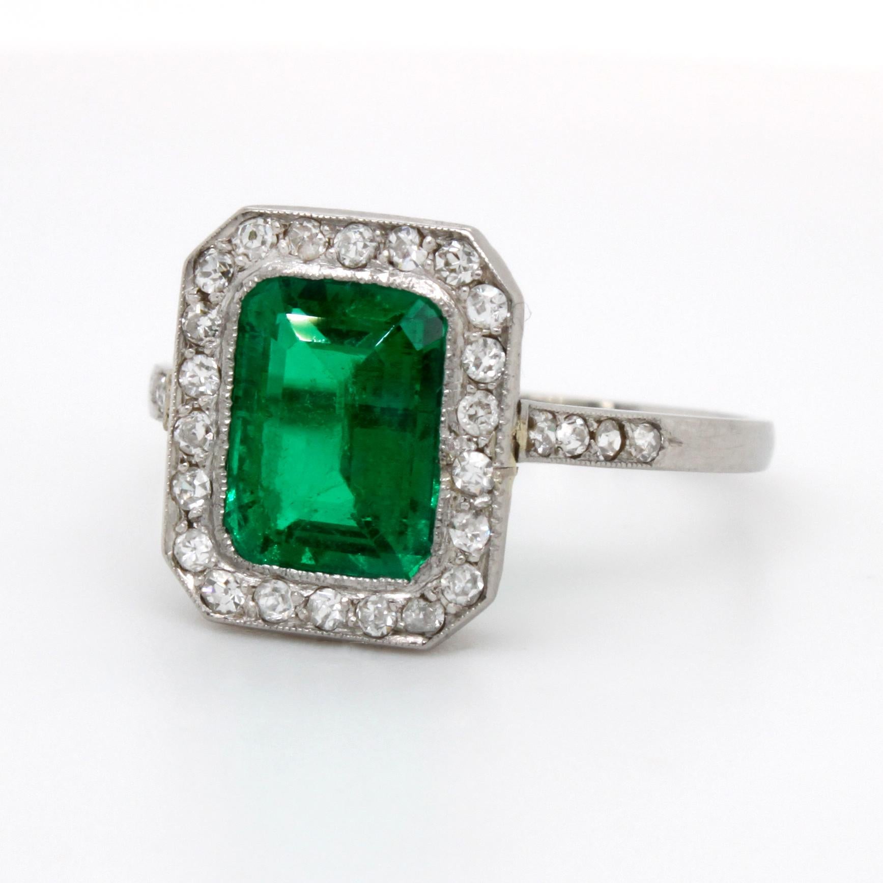 Edwardian Colombian Emerald and Diamond Ring, ca. 1910s

A beautiful and elegant ring set with a gem and old-mine Colombian emerald of ca. 1.6 carats and surrounded by diamonds of ca. 0.5 carats. The crown of the ring is made with a detailed