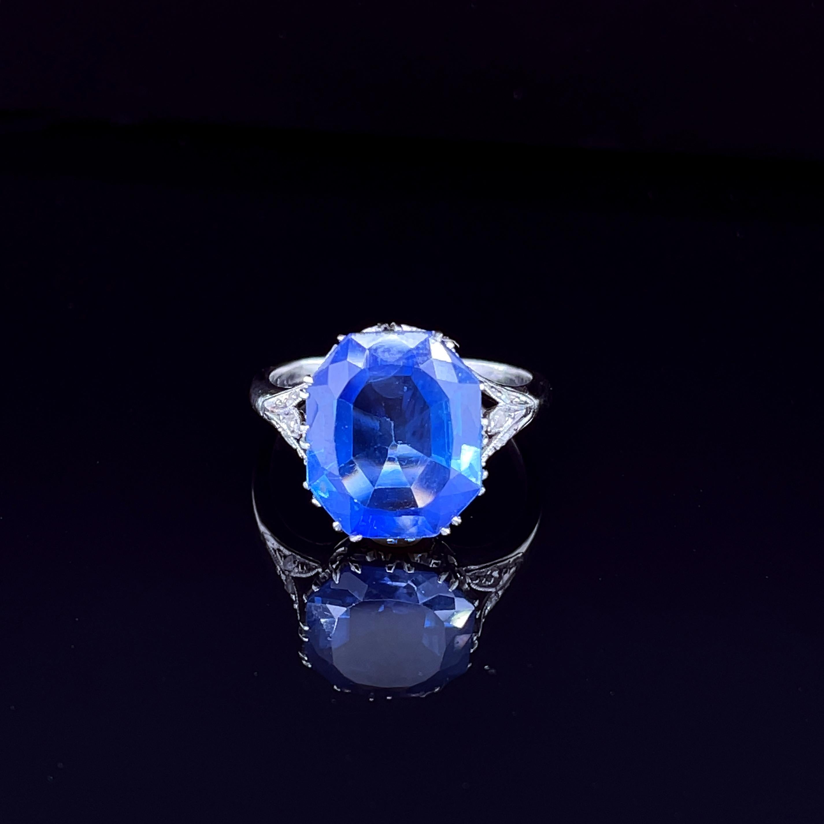 Belle Epoch Octagon Sapphire and Diamond Ring, ca. 1910s

A very stunning ring centring an octagonal cut natural unheated sapphire of 5.85 carats (certified), surrounded with small rose cut diamonds. The crown and prongs are artistically made in a
