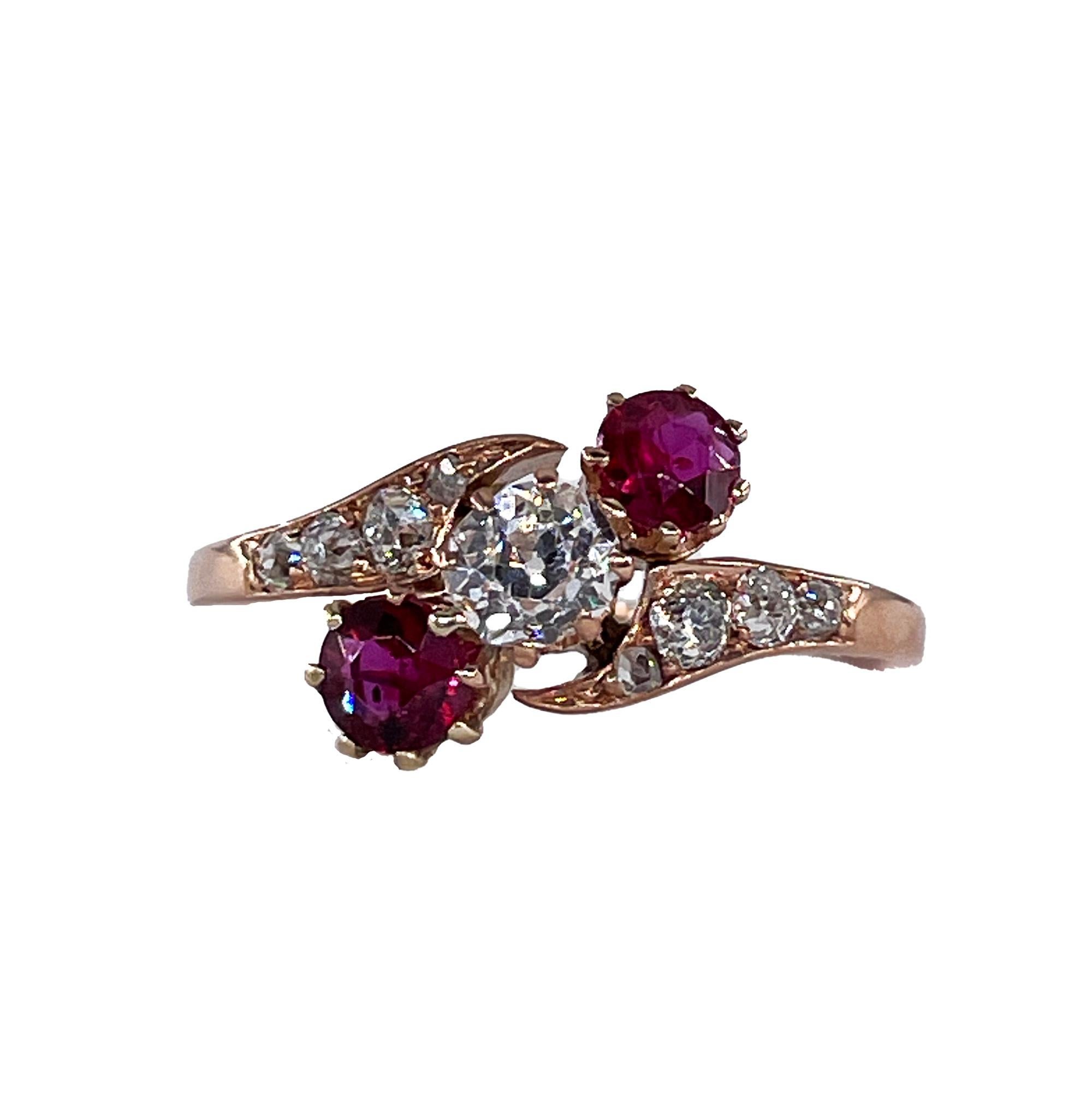Edwardian Antique Crossover GIA 1.10ct Ruby & Old Mine Cushion DIAMOND Three Stone 14K Gold Ring

A distinctively stunning 1900s delight measuring 3/4 inch long and exotically lovely, the sinuous curves of this sublime Edwardian-era delicacy display