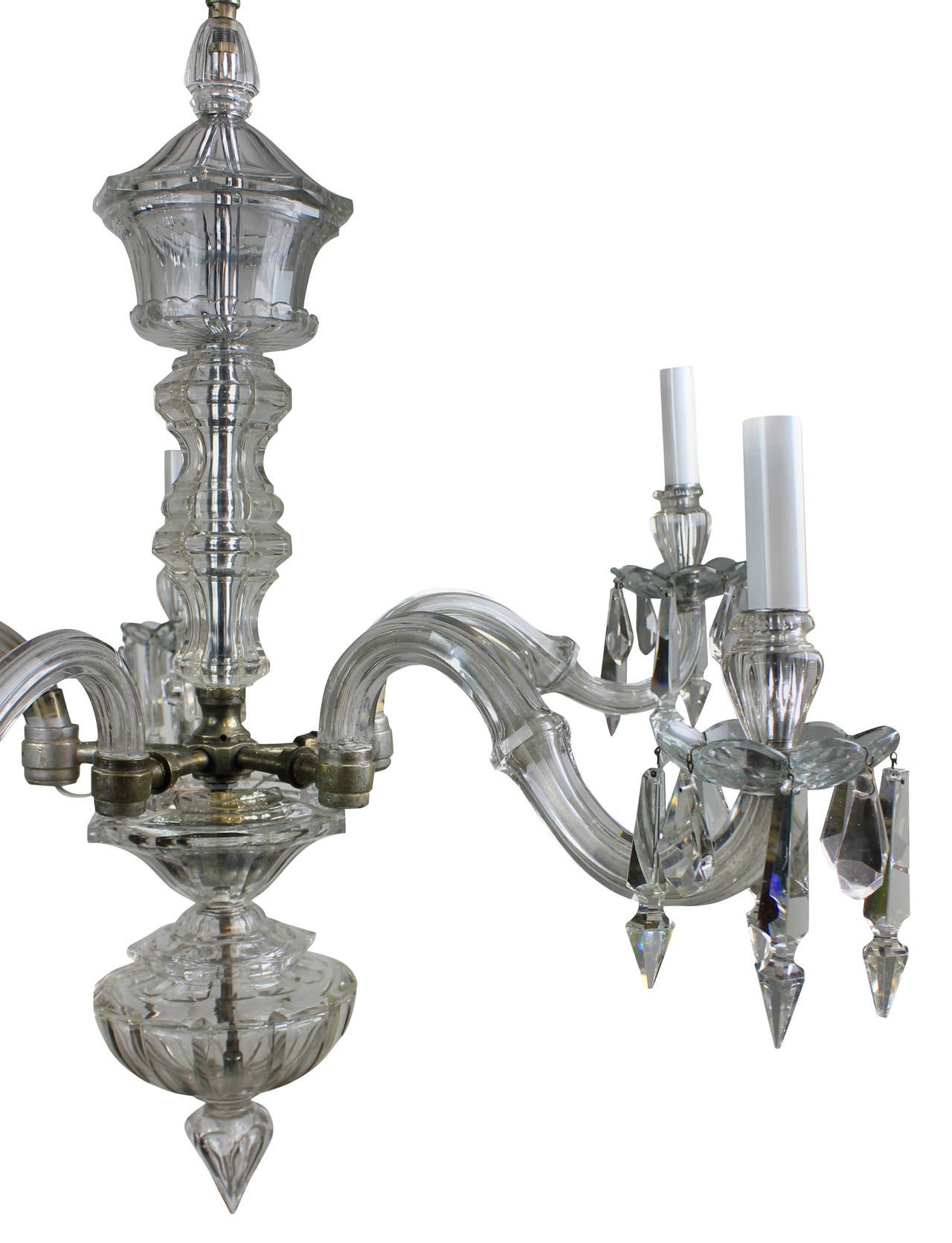 A small English cut glass chandelier in cut glass with central stem, generous fluted bowl and pendant drops. Formerly a gasolier.

 
