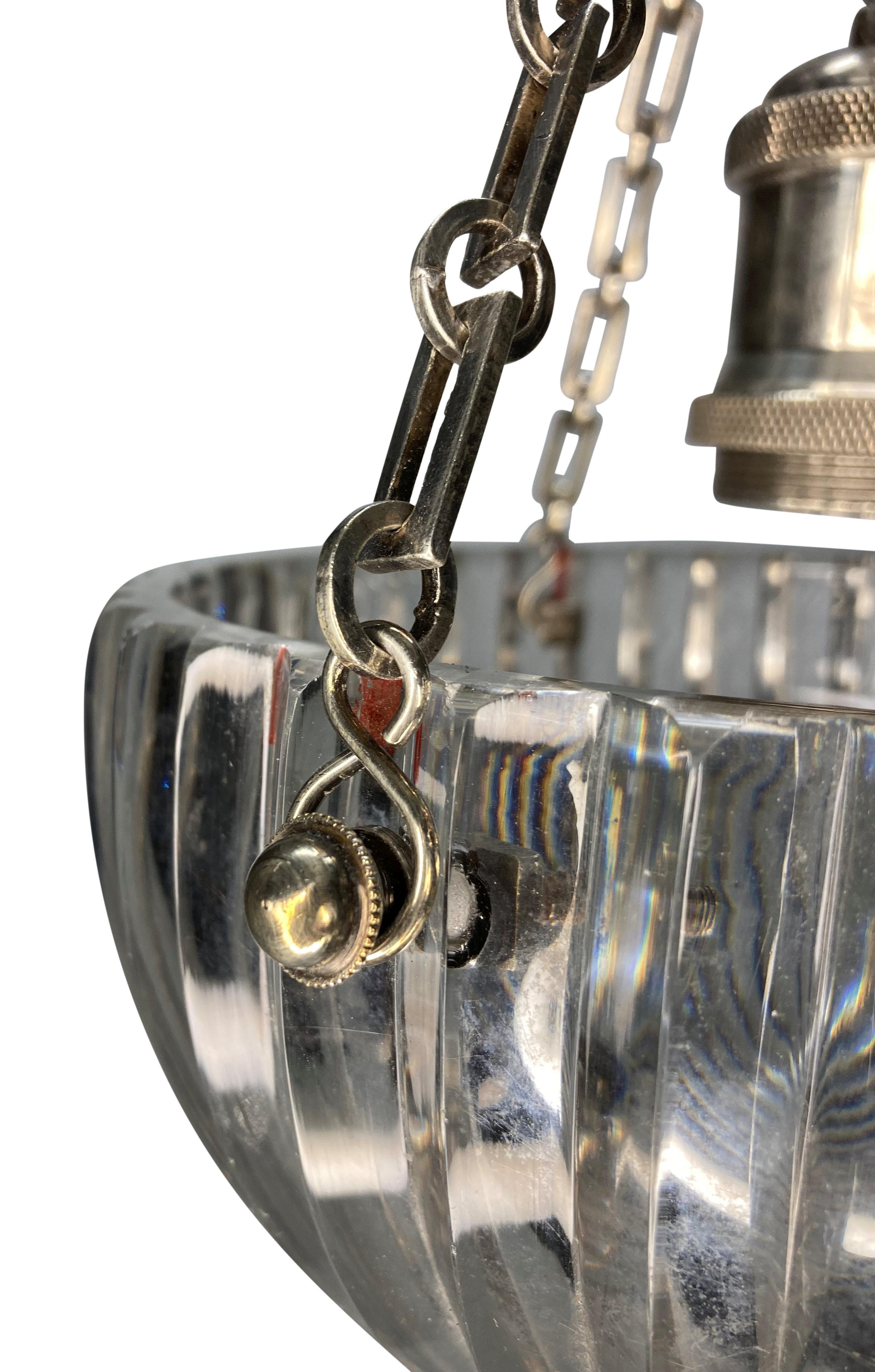 A fine English Edwardian cut glass and silver plated bronze pendant light, with a ribbed design.