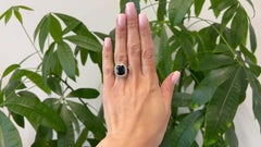 Edwardian Dark Blue Sapphire and Diamond Platinum Halo Ring