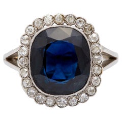 Antique Edwardian Dark Blue Sapphire and Diamond Platinum Halo Ring