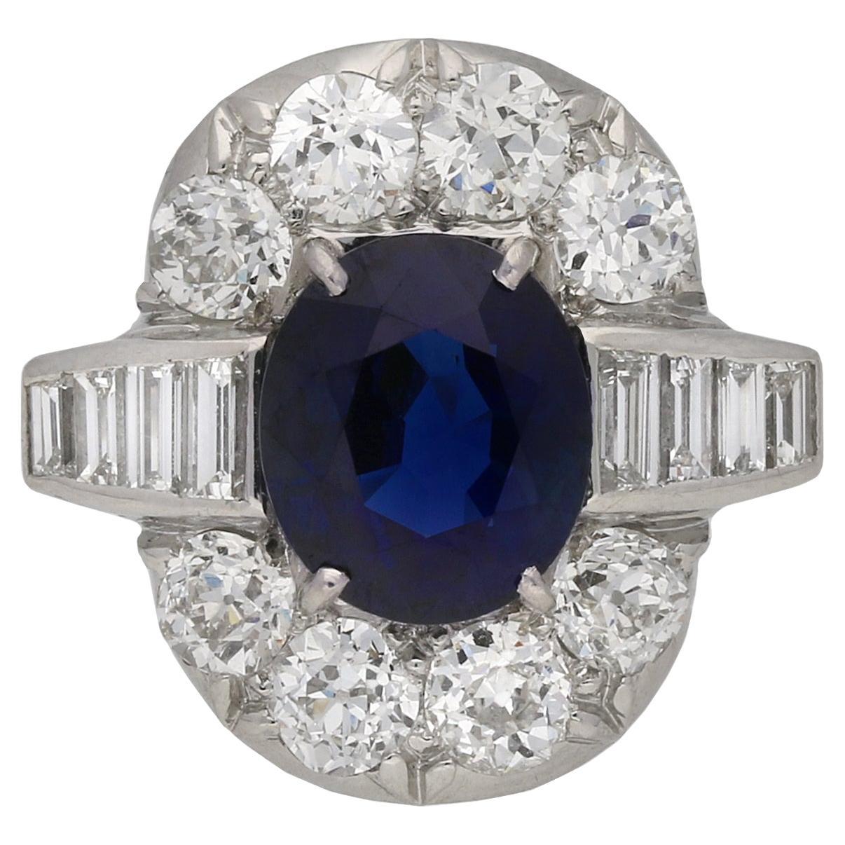 Edwardian deep Royal Blue Burmese sapphire and diamond cluster ring, circa 1915. For Sale